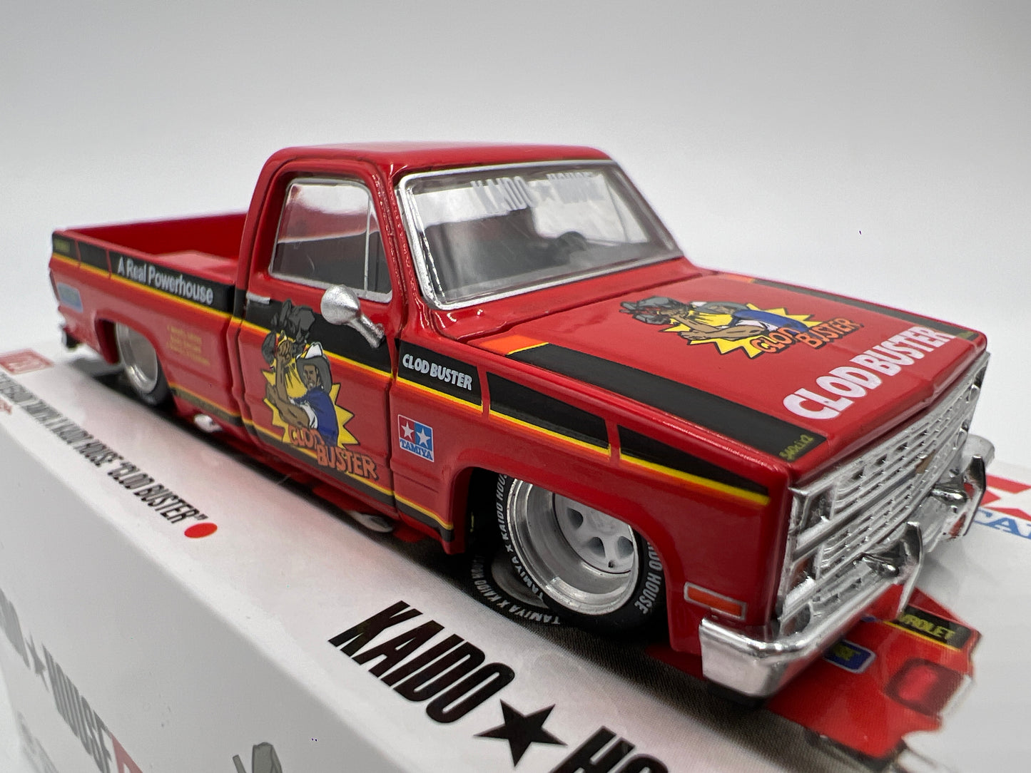Mini GT x Kaido House #130 Chevrolet Silverado Tamiya x Kaido House Clod Buster Orange