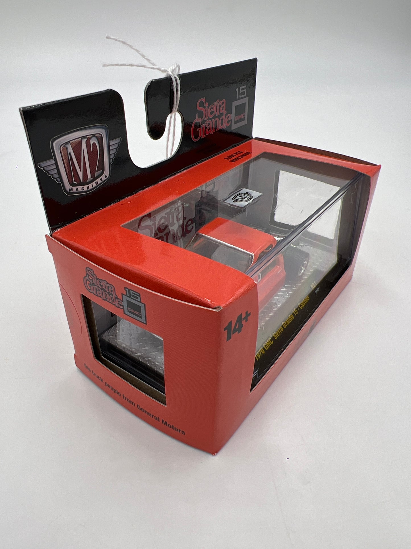 2024 M2 Machines 1976 GMC Sierra Grande 15 Orange Custom R81