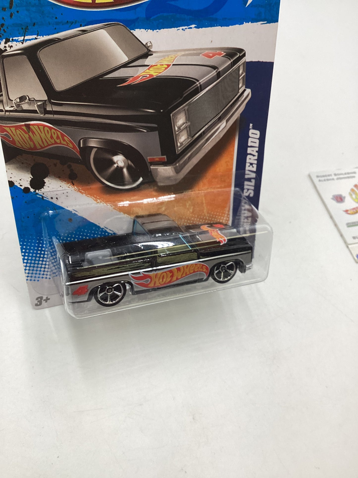 2011 Hot Wheels #156 Walmart Exclusive Black 83 Chevy Silverado with protector