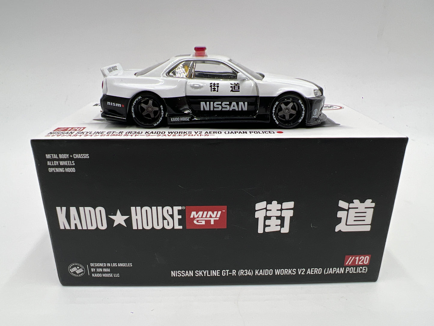 Mini GT x Kaido House #120 Nissan Skyline GT-R R34 Kaido Works V2 Aero Japan Police