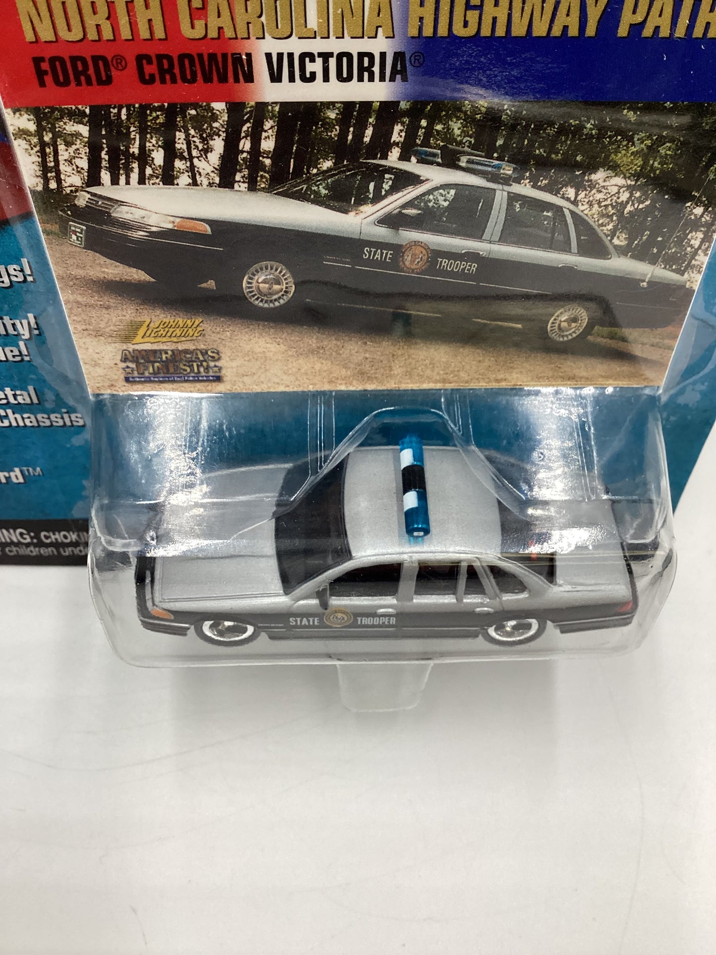 JOHNNY LIGHTNING Americas Finest North Carolina Highway Patrol Ford Crown Victoria Black/Silver 223H