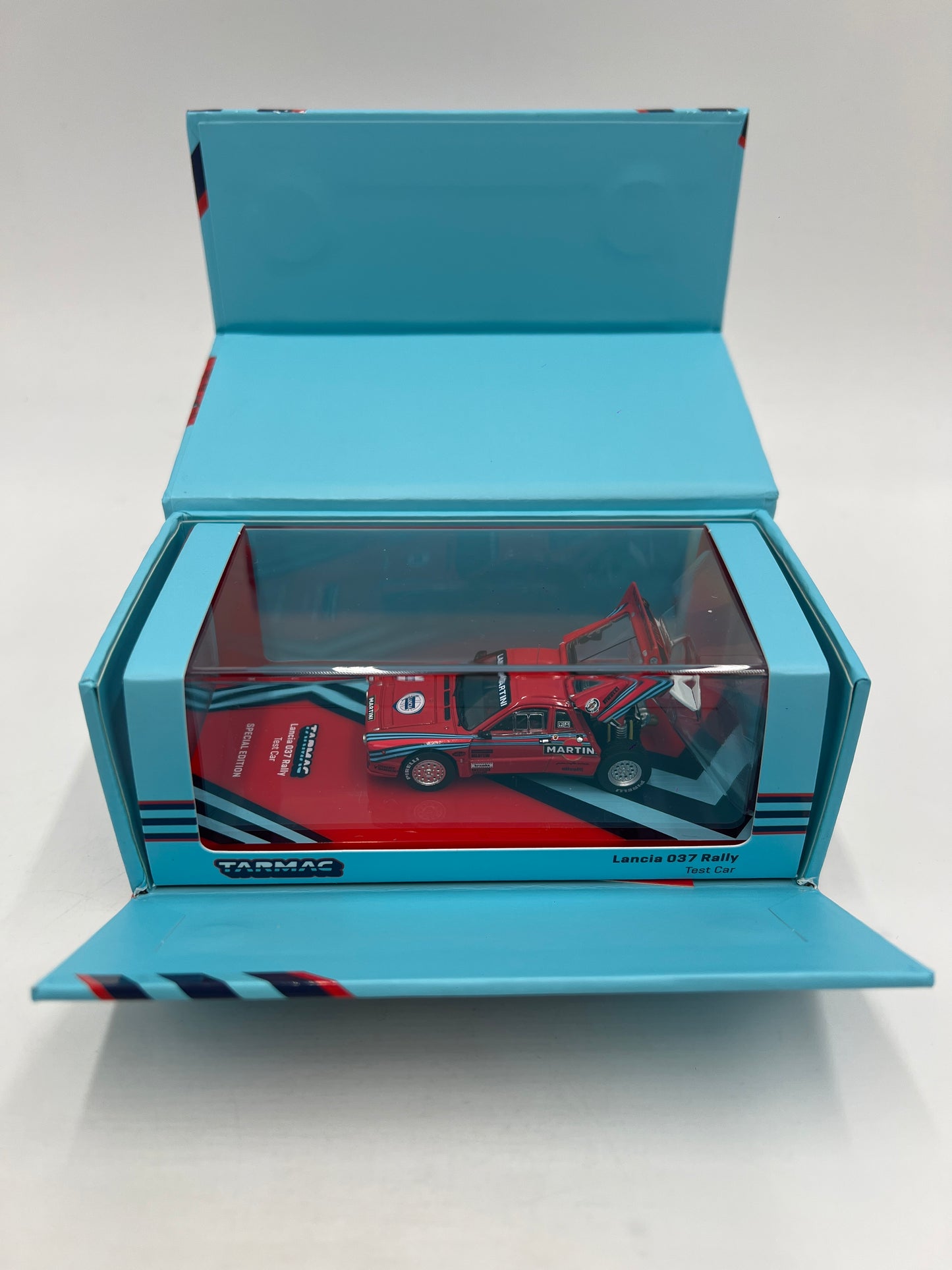 Tarmac Works x Hobby64+ Lancia 037 Rally Test Car Martini Special Edition