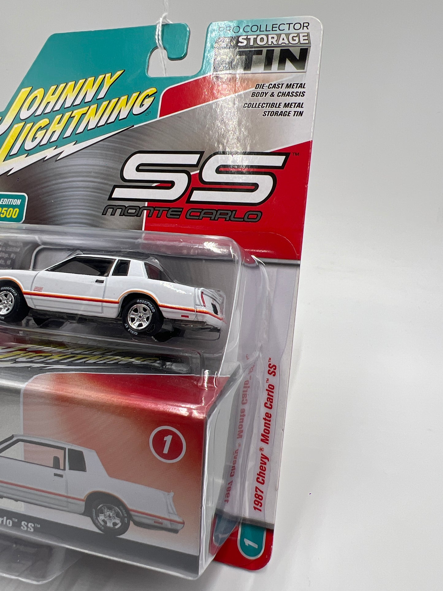 Johnny Lightning Storage Tin Release 1 Version A 1987 Chevy Monte Carlo SS White 1/2500