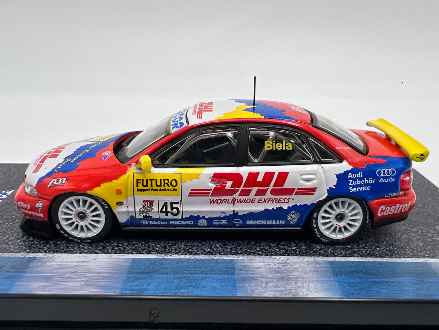 Tarmac Works x Hobby64 Audi A4 Quattro DHL Super Tourenwagen Cup 1998