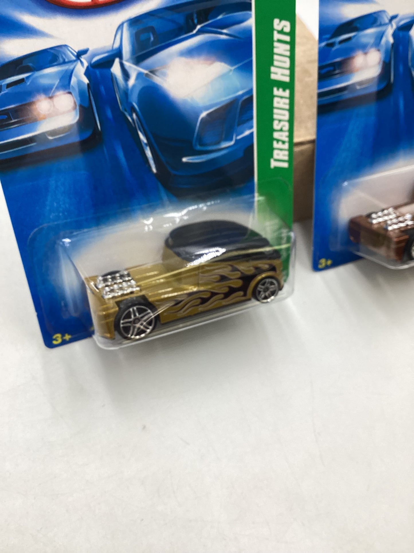 2008 Hot Wheels Super Treasure Hunt + Treasure Hunt Qombee Gold #166 with protector