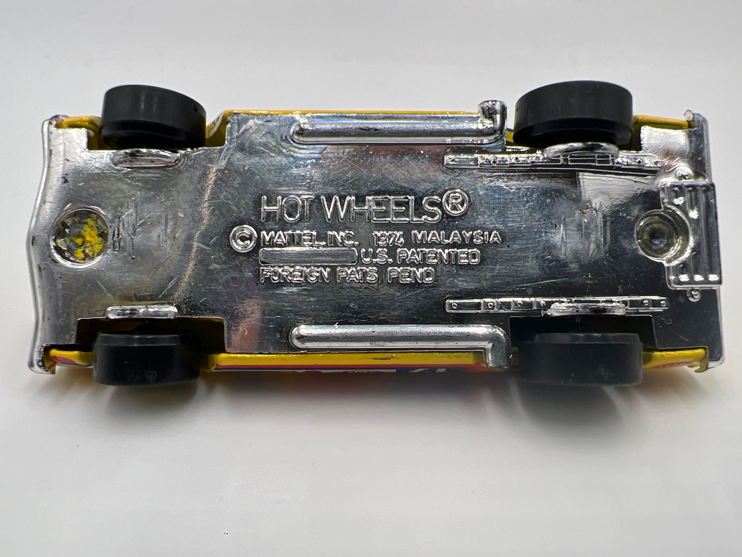 Hot Wheels 1/64 Vintage The Hot Ones Torino Stocker Malaysia Base Yellow Loose