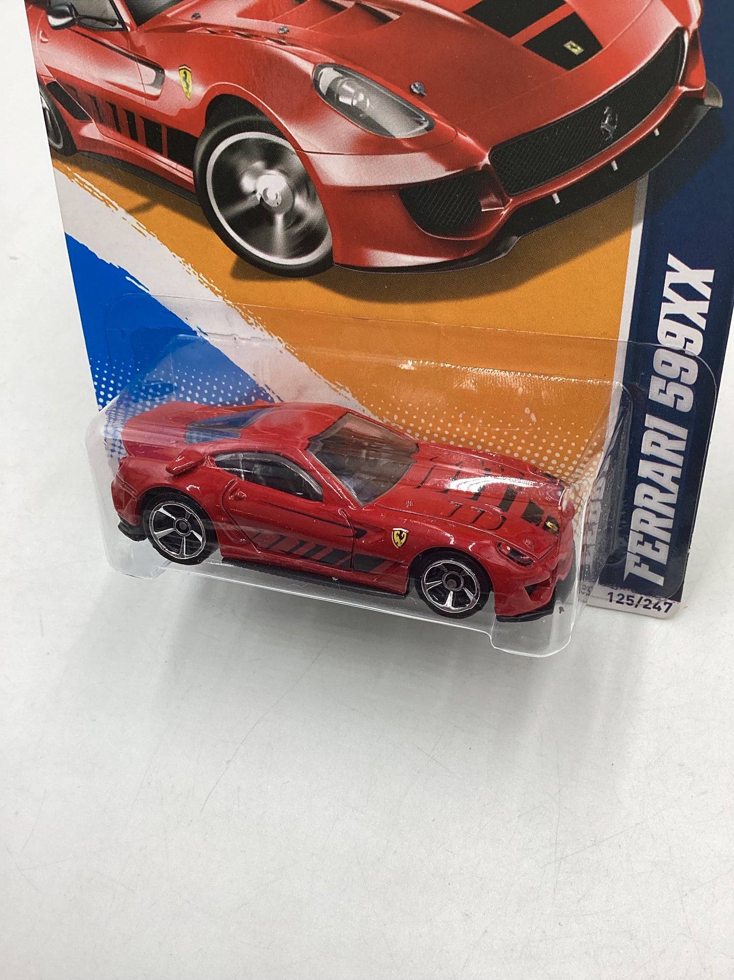 2012 Hot wheels #125 Red Ferrari 599XX with protector