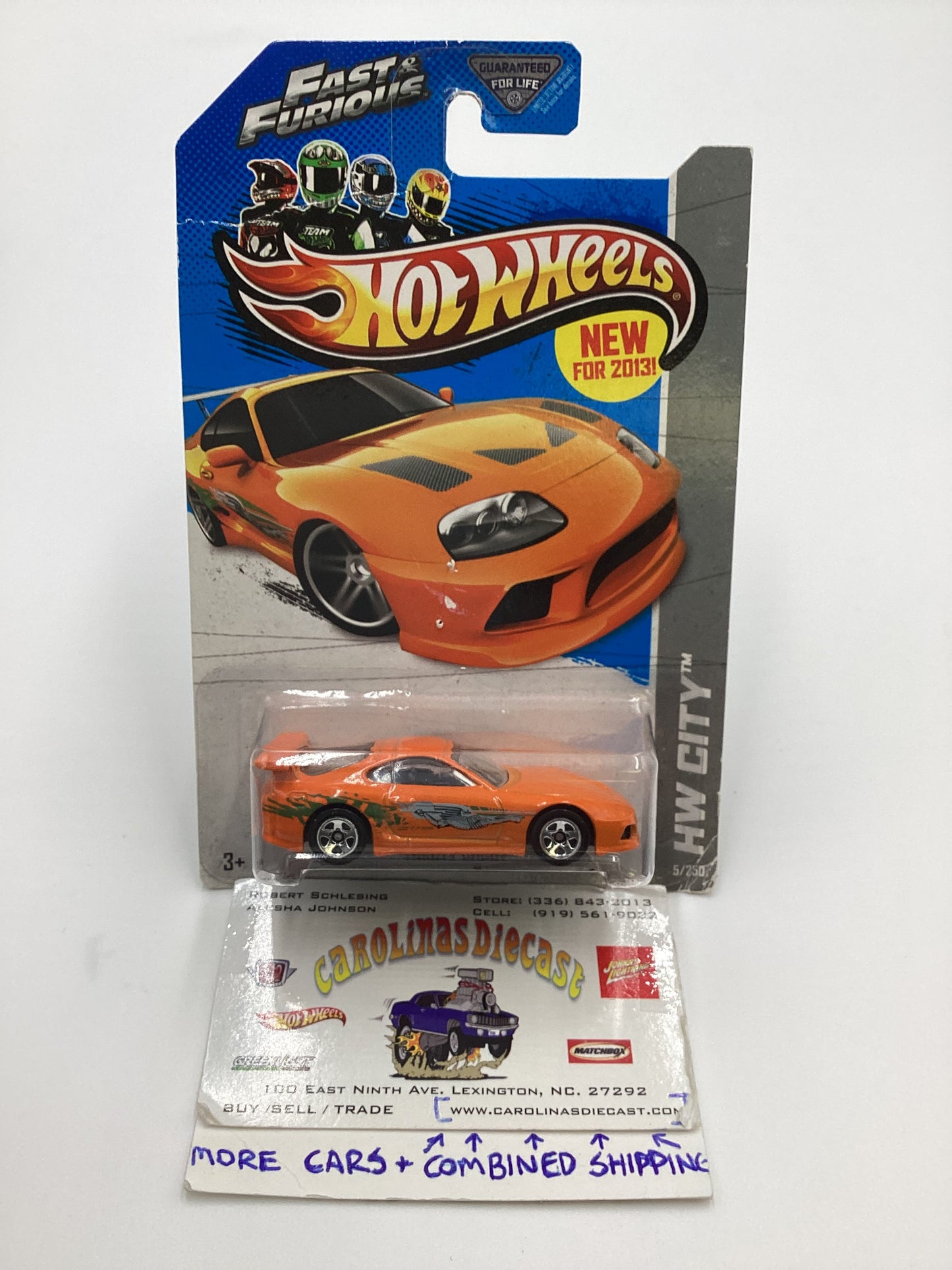 2013 Hot Wheels Fast and furious #5 Toyota Supra Orange with protector Card not perfect