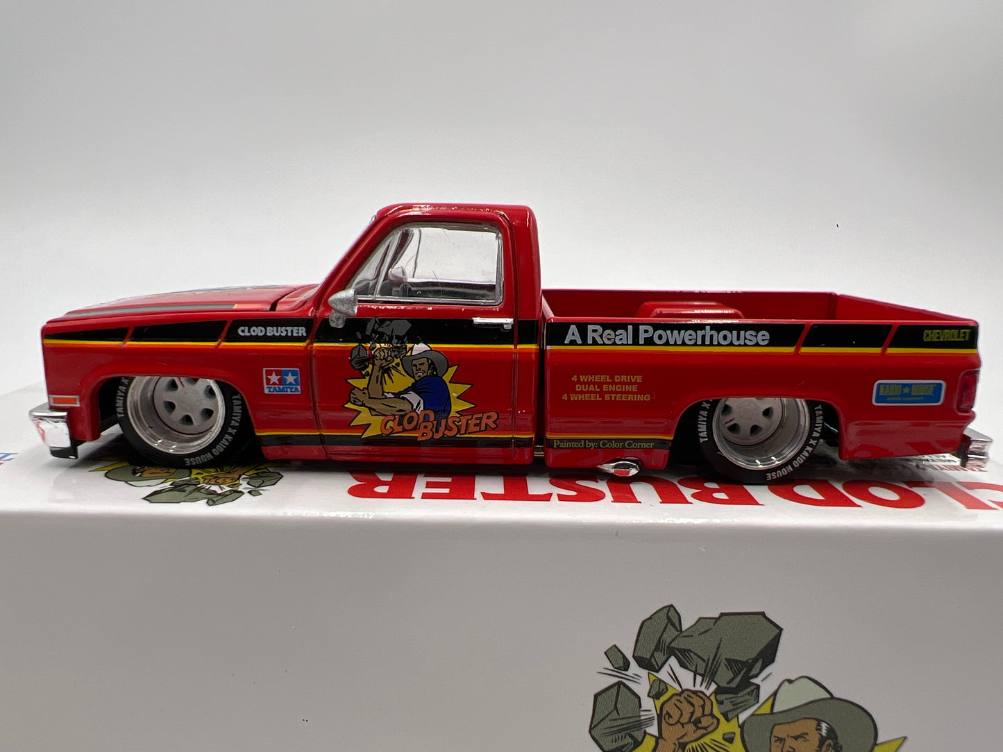 Mini GT x Kaido House #130 Chevrolet Silverado Tamiya x Kaido House Clod Buster Orange