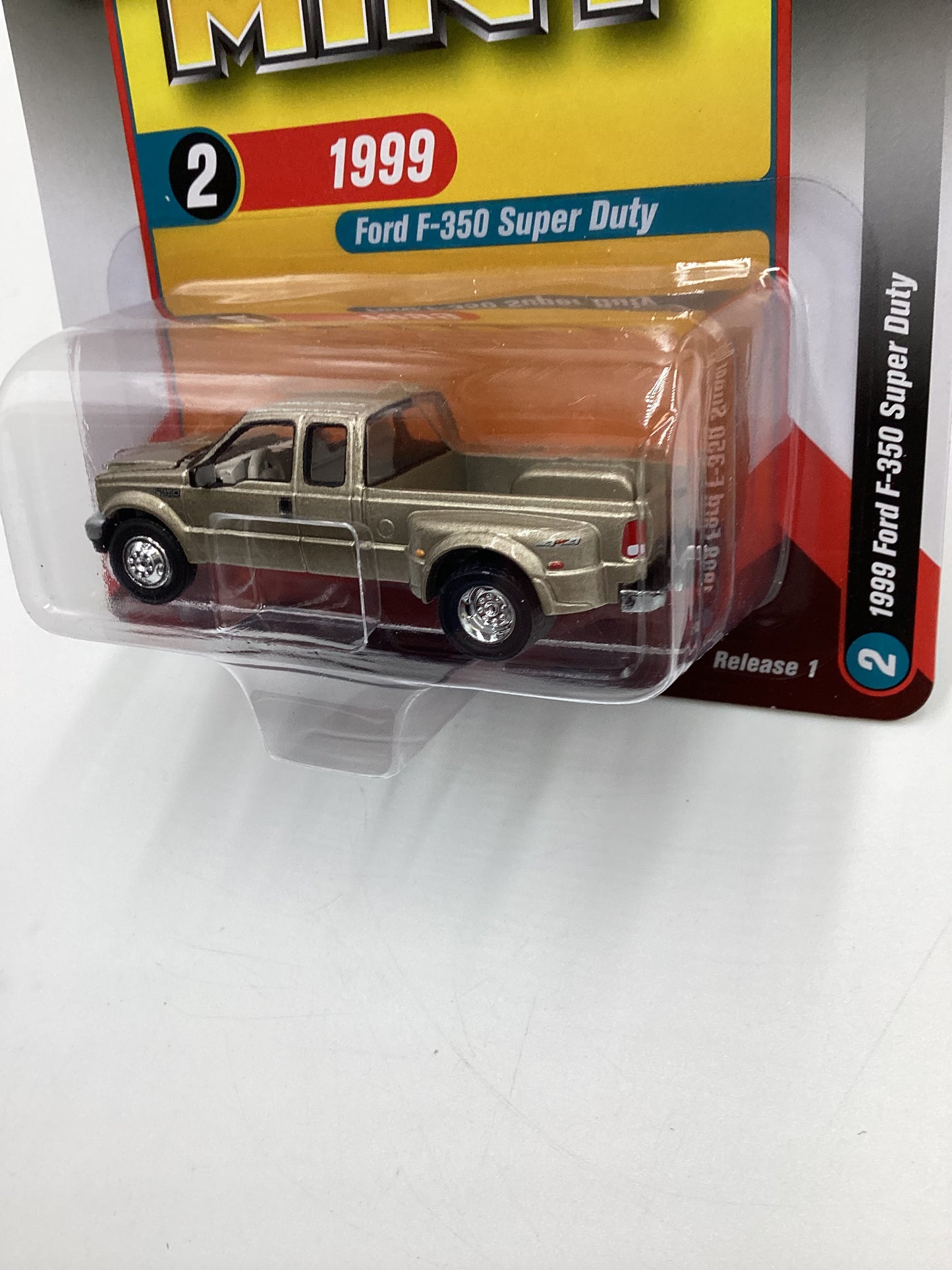 Racing Champions Mint #2 Release 1 Version B 1999 Ford F-350 Super Duty Dually Gold