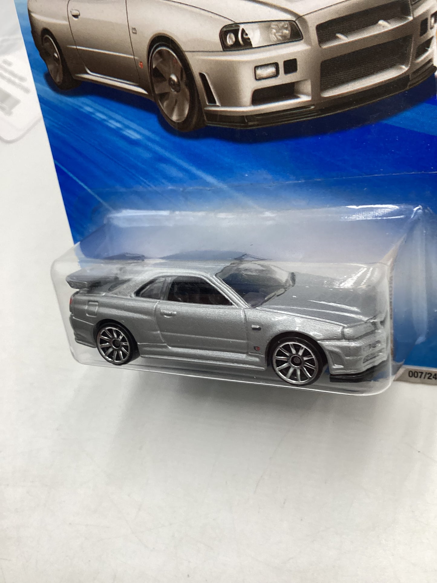 2010 Hot Wheels #007 Silver Nissan Skyline GT-R R34 W/Protector