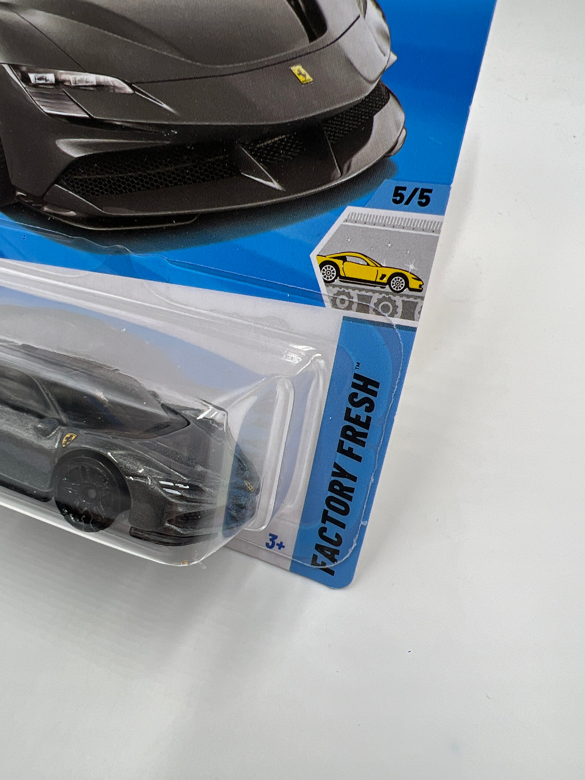 The product is a 2025 Hot Wheels Ferrari SF90 Stradale in Metallic Charcoal Grey color, part of the Factory Fresh series. This diecast car is in 1:64 scale and comes in an The product is a 2025 Hot Wheels Ferrari SF90 Stradale in Metallic Charcoal Grey color, part of the Factory Fresh series. This diecast car is in 1:64 scale and comes in an