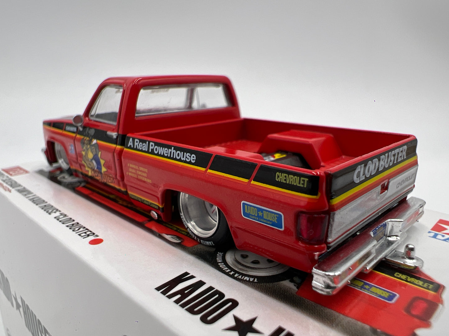 Mini GT x Kaido House #130 Chevrolet Silverado Tamiya x Kaido House Clod Buster Orange