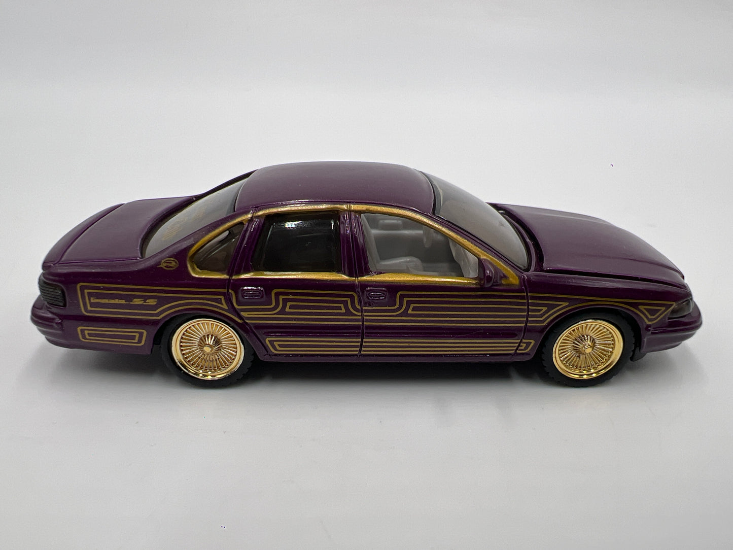 Revell 1/64 Lowrider Magazine #134 96 Chevy Impala SS Purple/Gold Loose