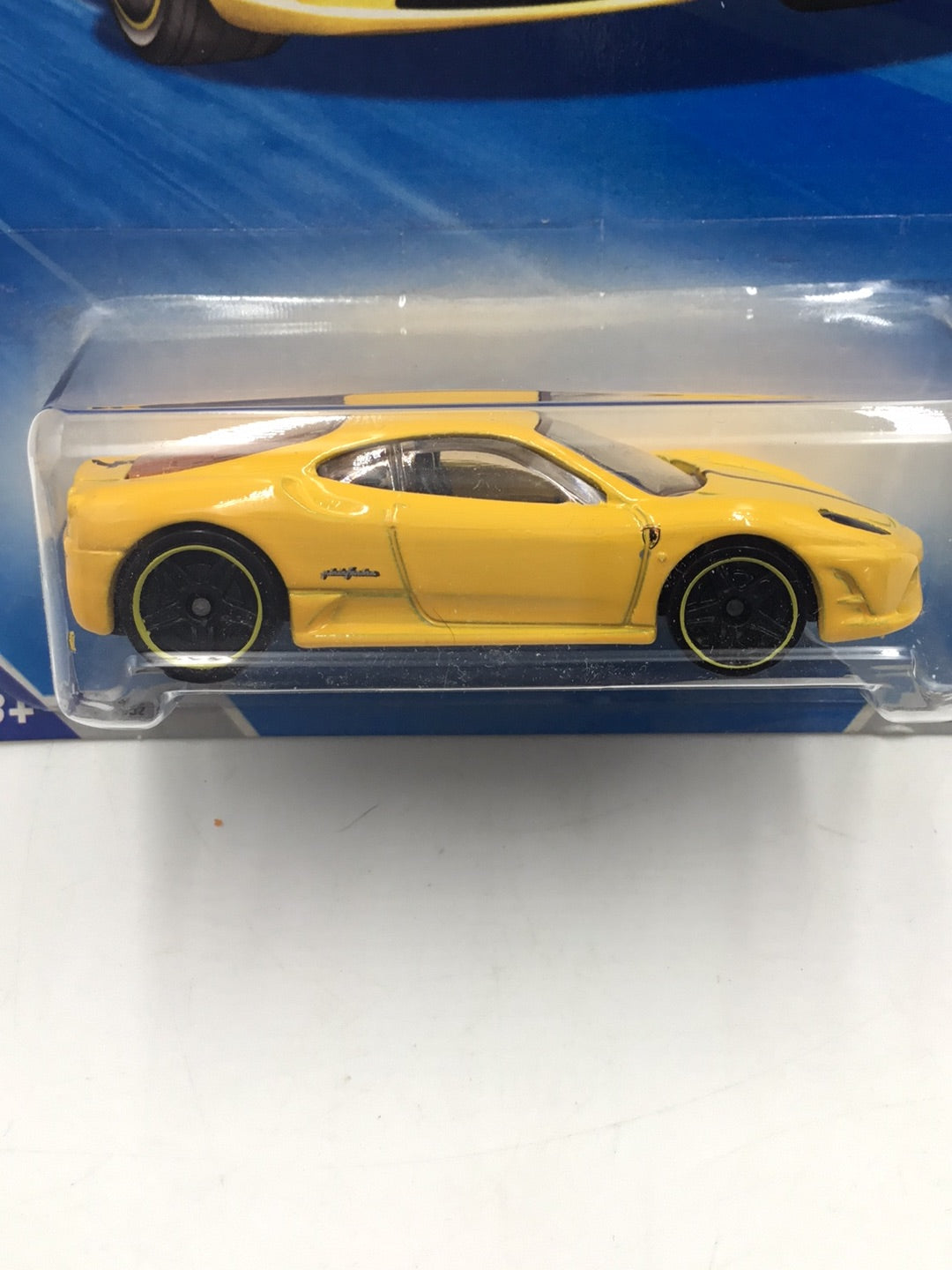 2010 Hot Wheels #127 Ferrari 430 Scuderia yellow with protector