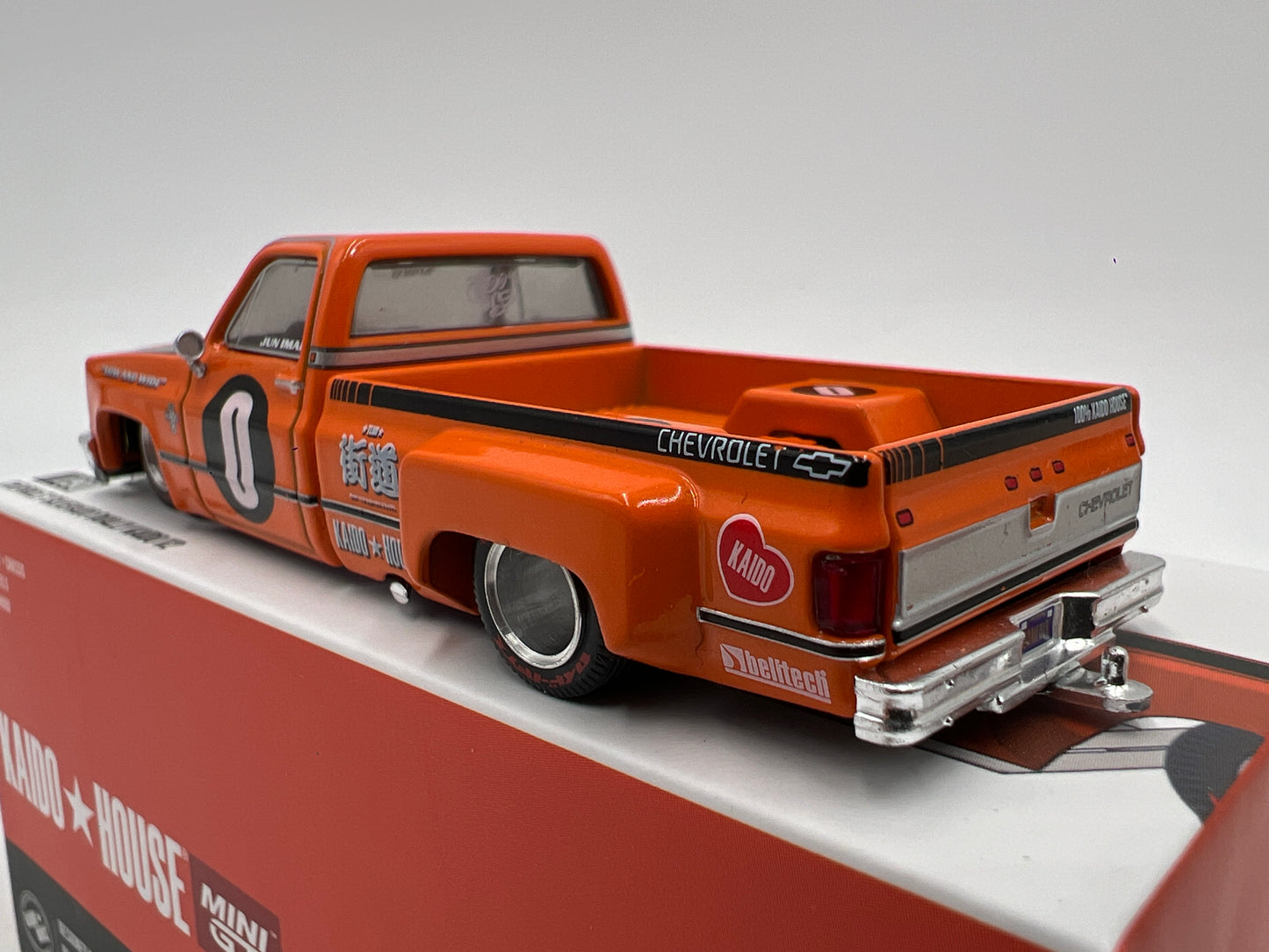 Mini GT x Kaido House #90 Chevrolet Silverado Dually Kaido V2 Orange