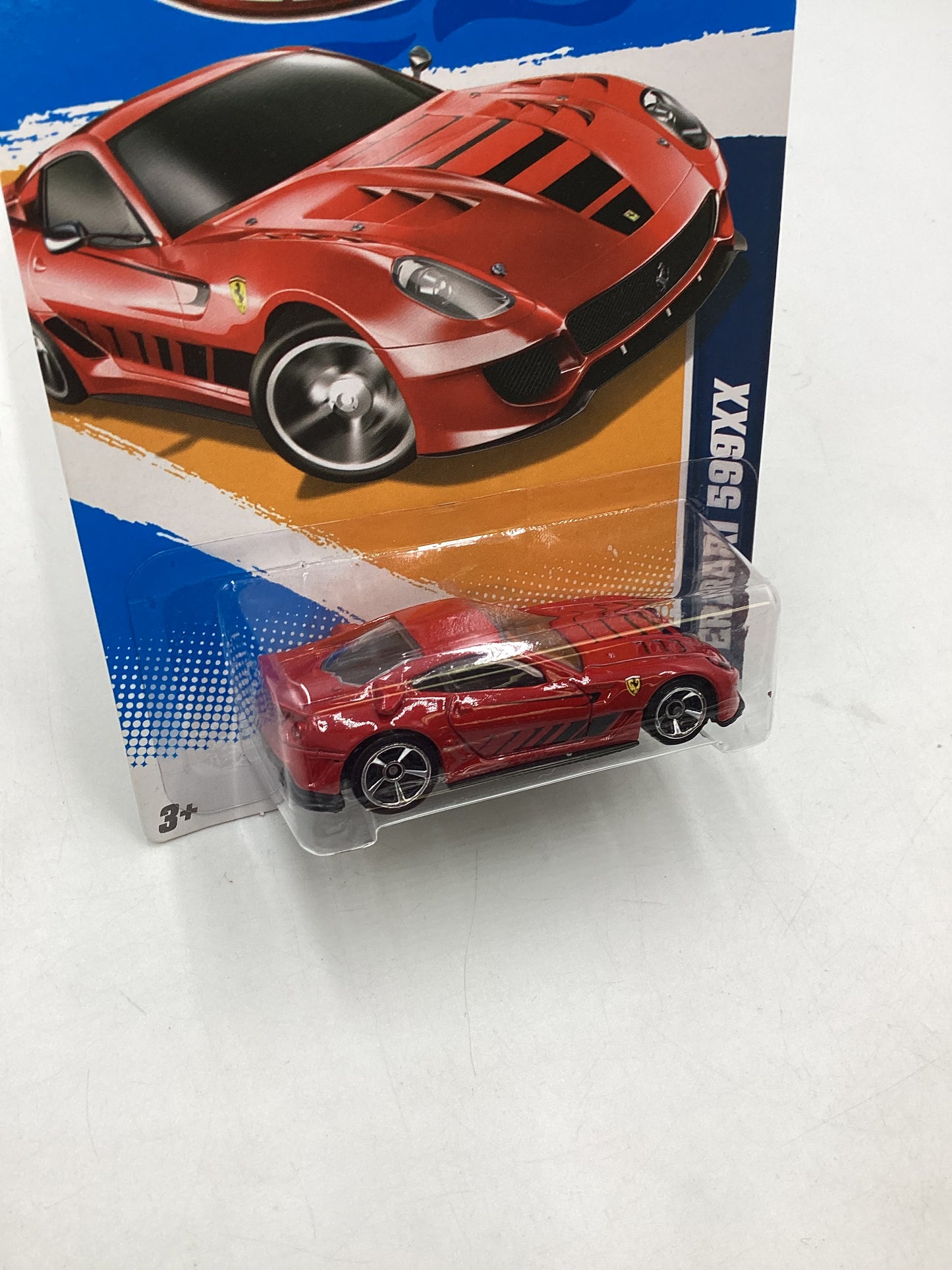 2012 Hot wheels #125 Red Ferrari 599XX with protector