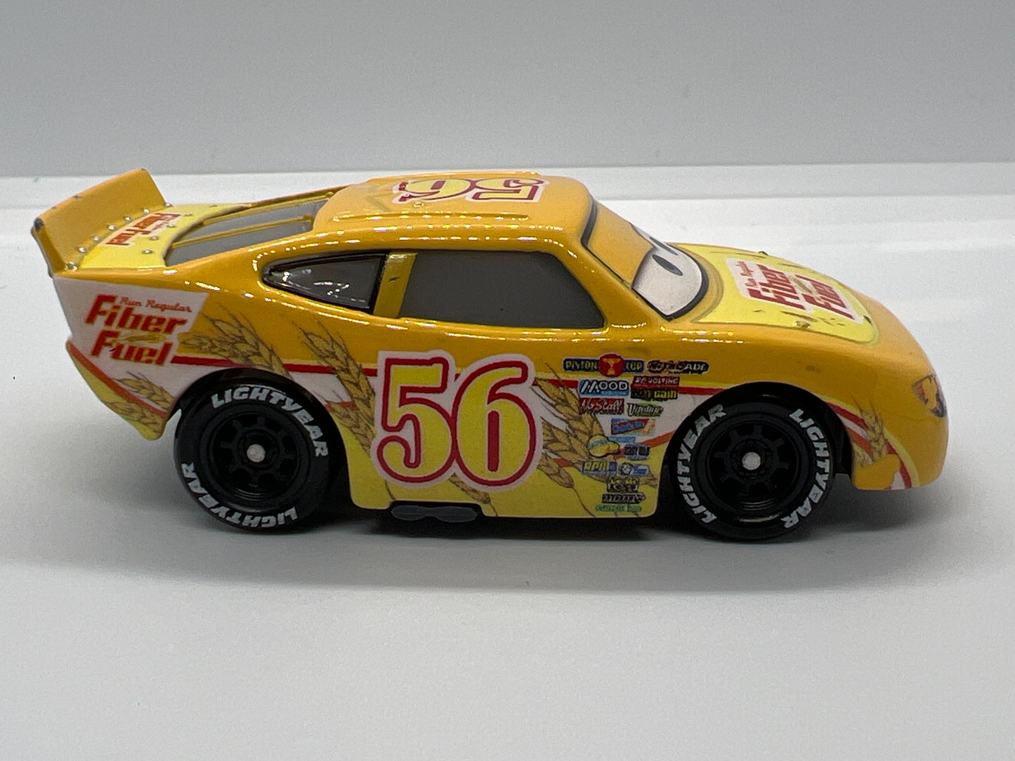 Disney Pixar Cars #42 Brusho Curber Fiber Fuel Yellow Loose