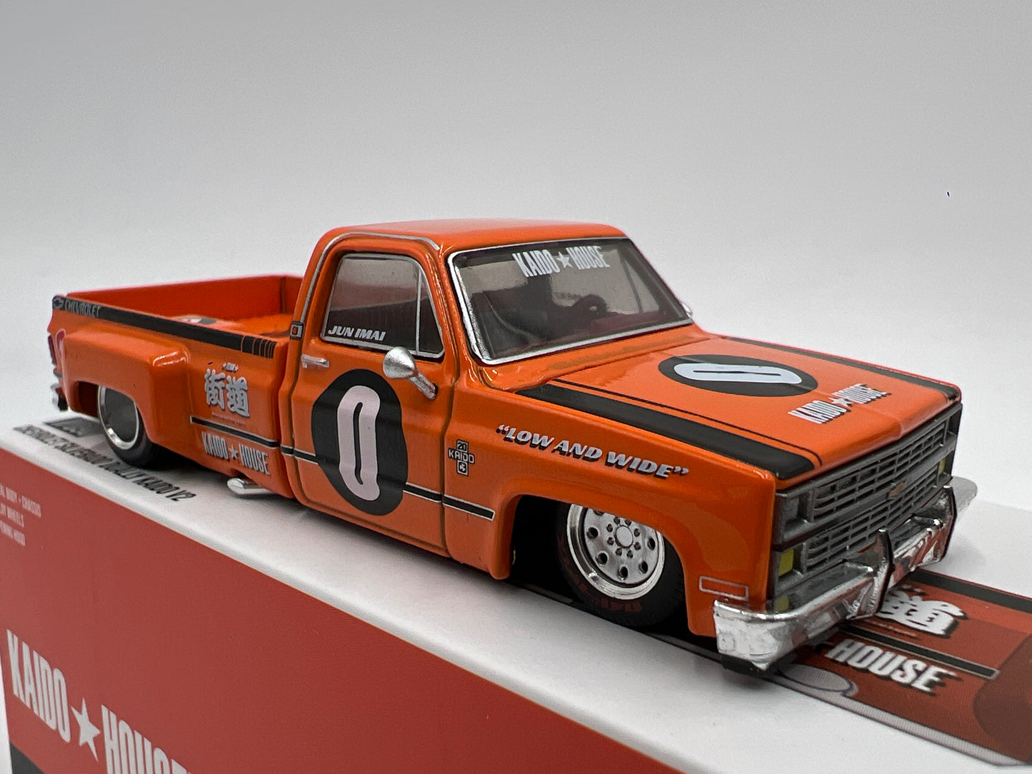 Mini GT x Kaido House #90 Chevrolet Silverado Dually Kaido V2 Orange