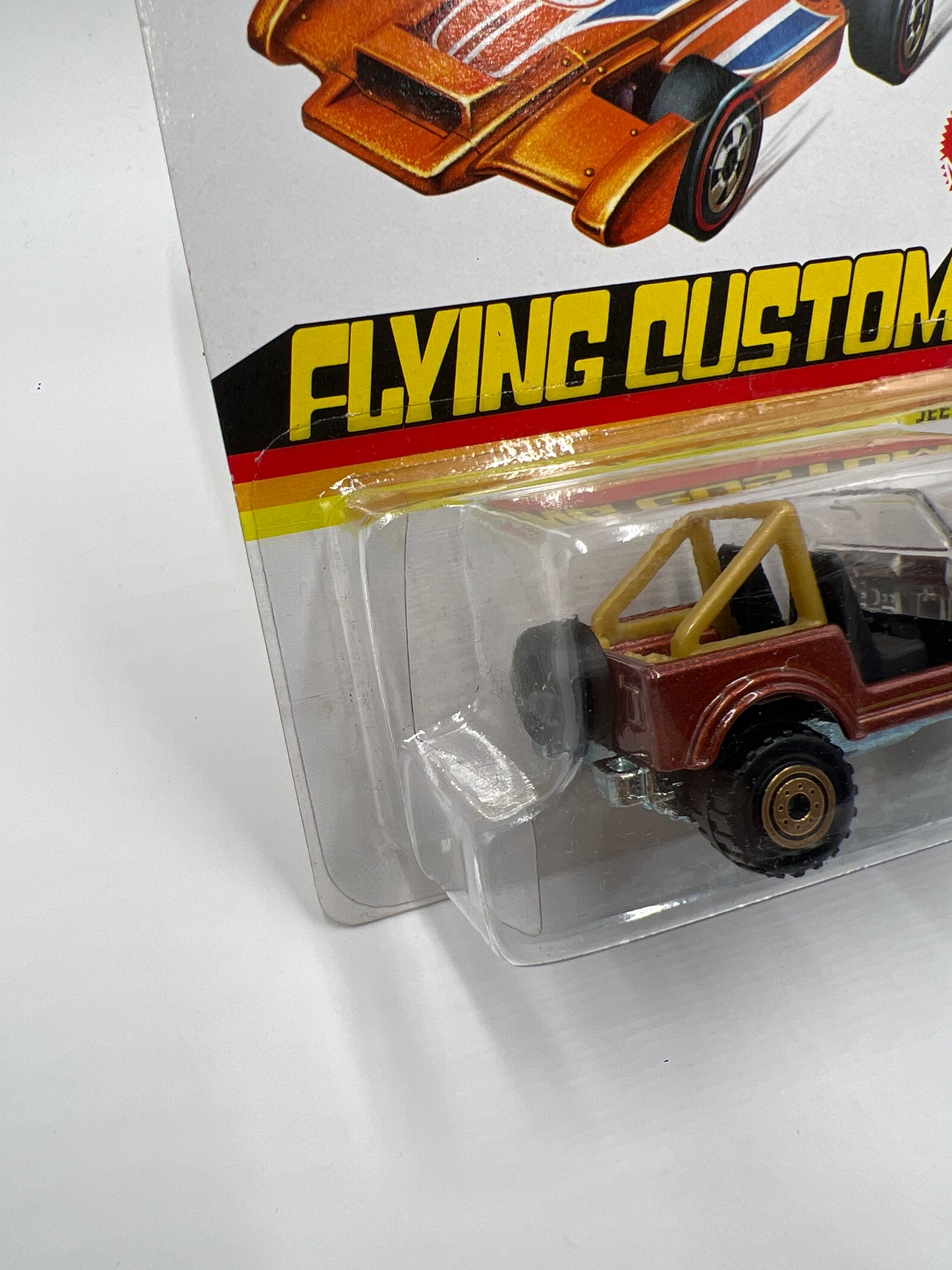 2013 Hot Wheels Flying Customs Jeep CJ-7 Brown W/Protector