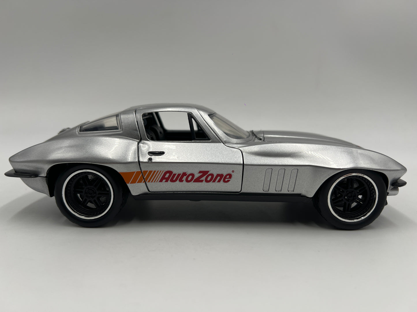 Jada 1/24 Scale AutoZone 1966 Chevy Corvette Silver Loose