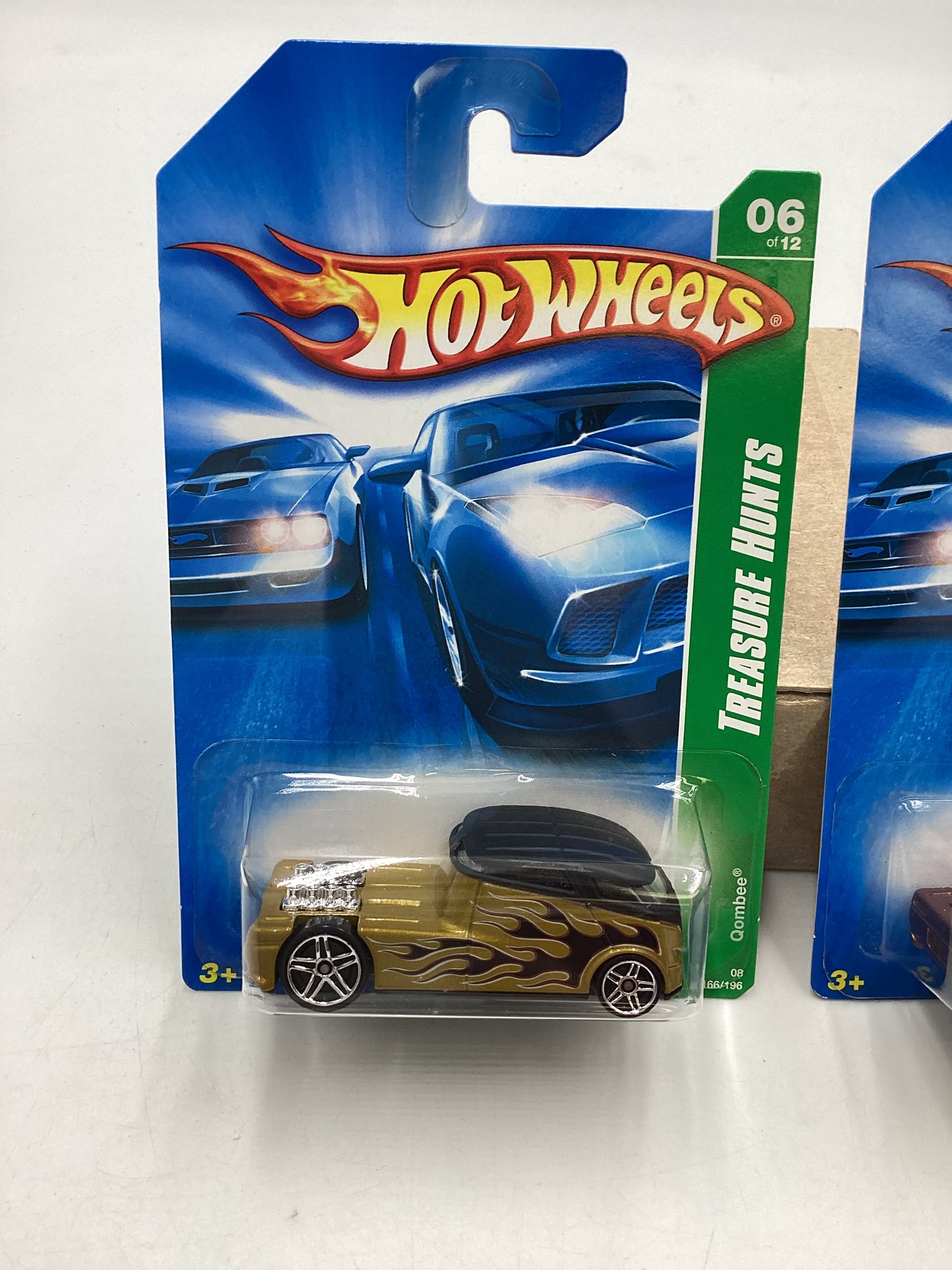 2008 Hot Wheels Super Treasure Hunt + Treasure Hunt Qombee Gold #166 with protector