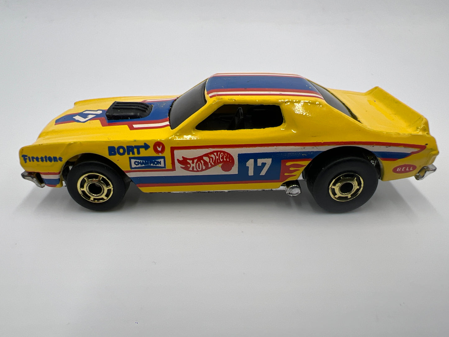 Hot Wheels 1/64 Vintage The Hot Ones Torino Stocker Malaysia Base Yellow Loose
