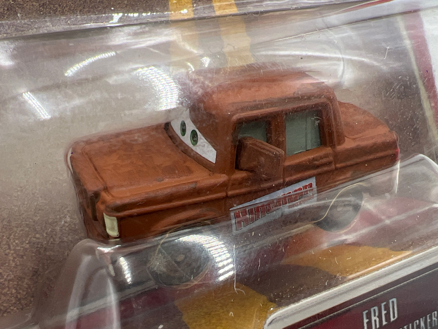 Disney Pixar The World Of Cars #67 CHASE Fred With Bumper Stickers Loose Blister