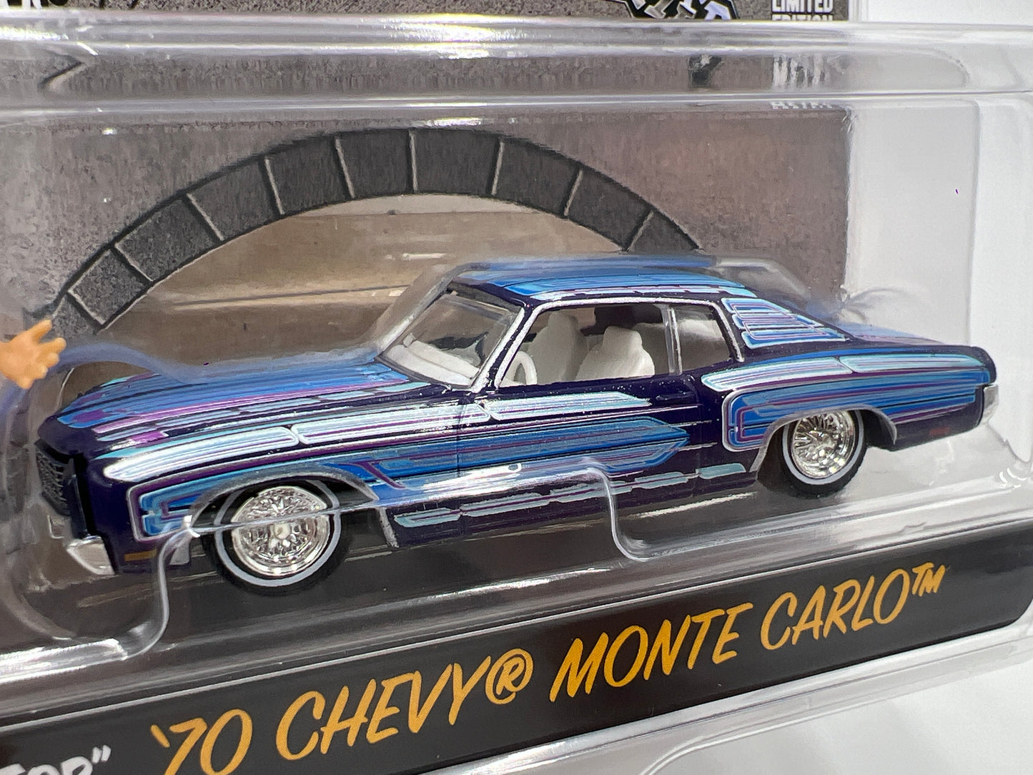 Greenlight x DGA Homie Rollerz 70 Chevy Monte Carlo Blue/Purple & Mr Grins/Tree Top 222C