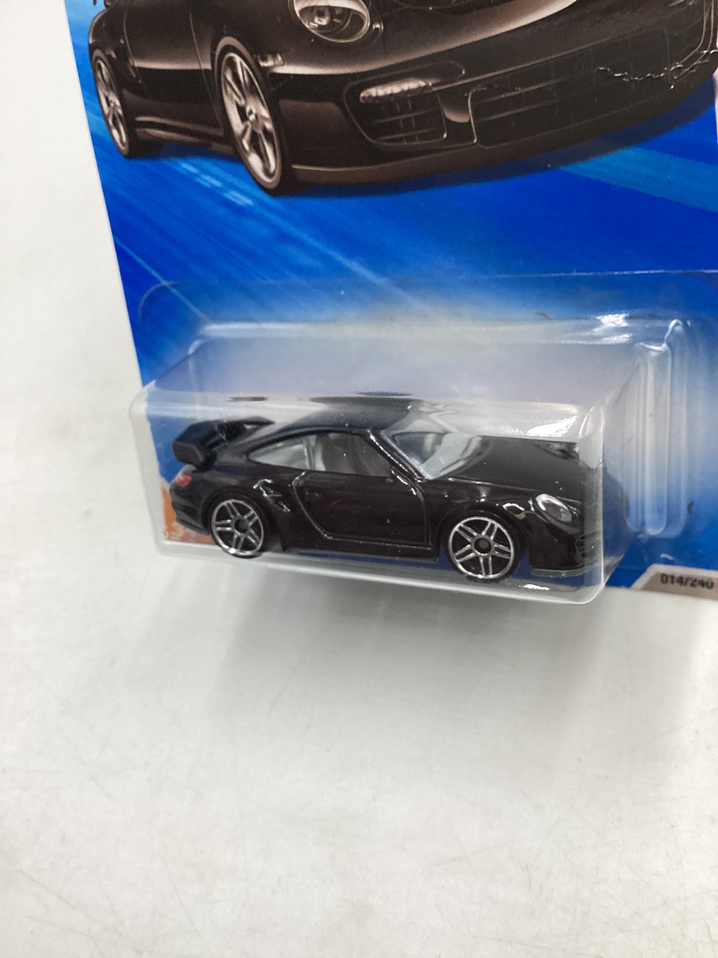 2010 Hot Wheels #014 Black Porsche 911 GT2 *Creased Card*