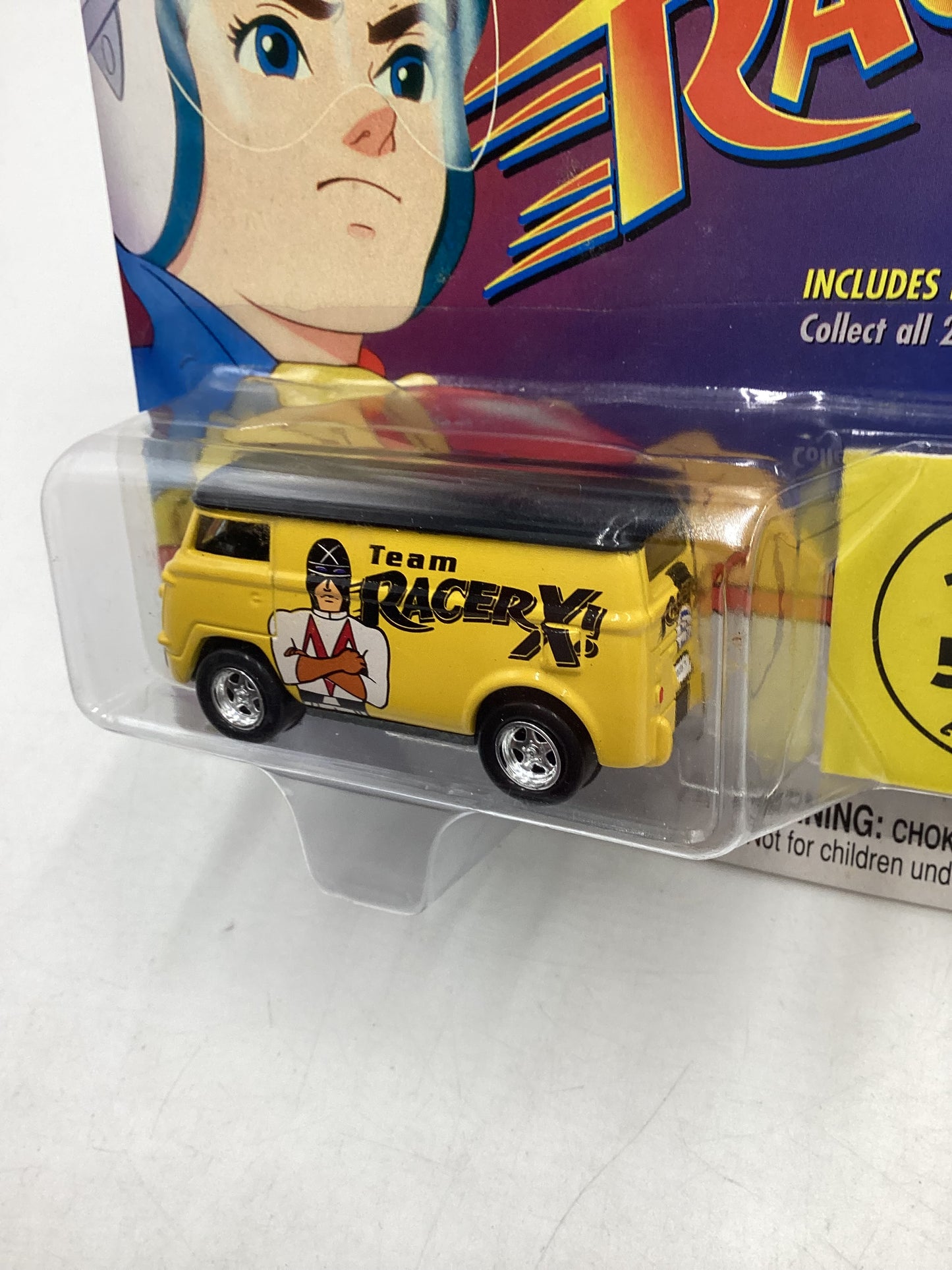 Johnny Lightning Speed Racer 2000 1/5000 VW Panel Van Yellow Team Racer X Cracked Blister