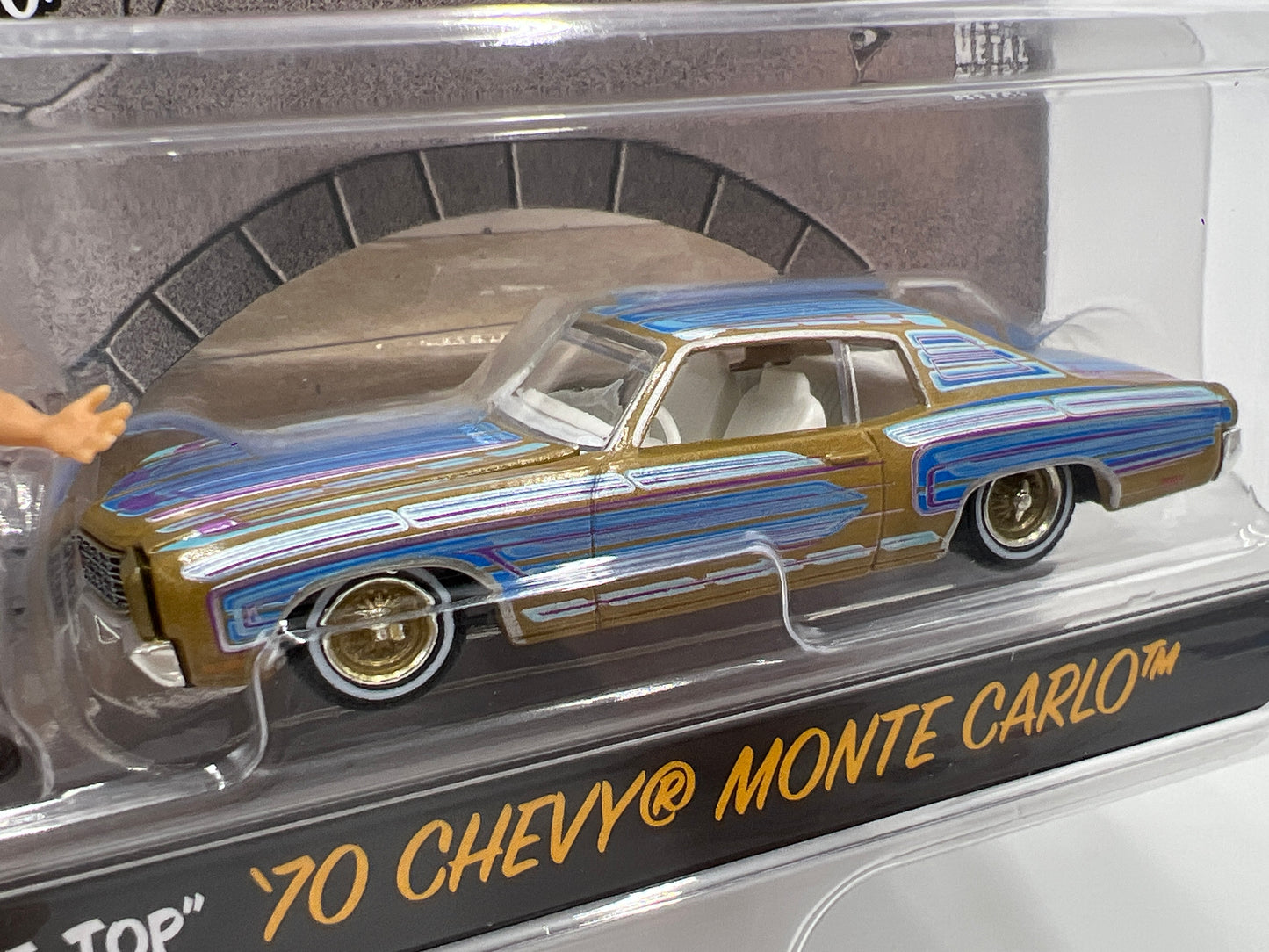 Greenlight x DGA Homie Rollerz CHASE 70 Chevy Monte Carlo Blue/Gold & Mr Grins/Tree Top