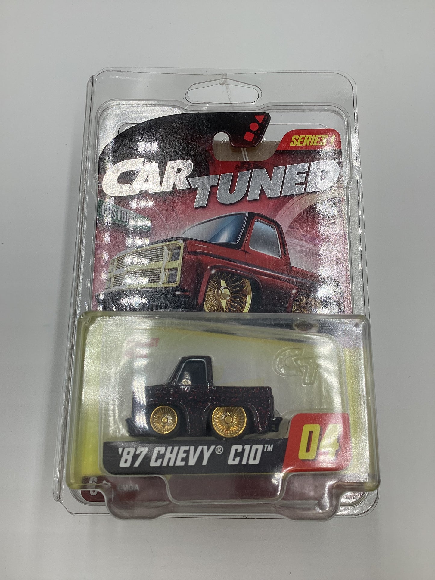 2024 Car Tuned Series 1 #04 87 Chevy C10 Black / Red Metal Flake Walgreens Exclusive with protector