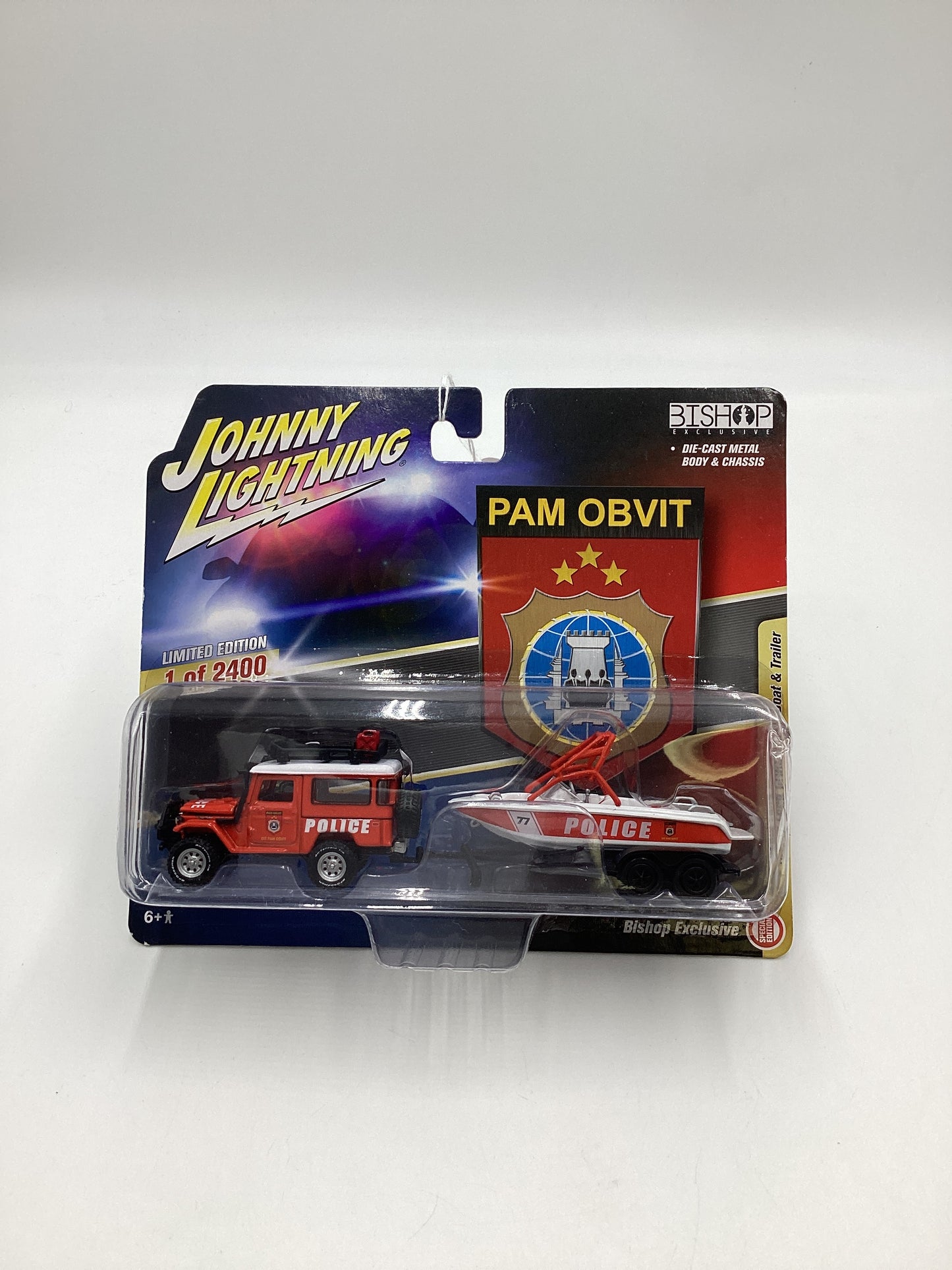 Johnny Lightning Bishop Exclusive Pam Obvit 1980 Toyota Land Cruiser w/ Boat & Trailer