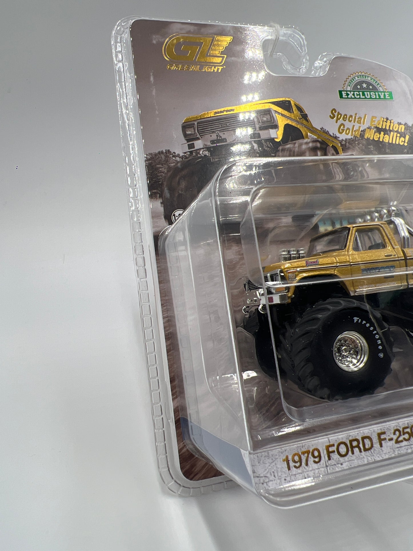 Greenlight Hobby Exclusive Kings of Crunch Bigfoot 50th Anniversary 1979 Ford F-250 Gold Metallic