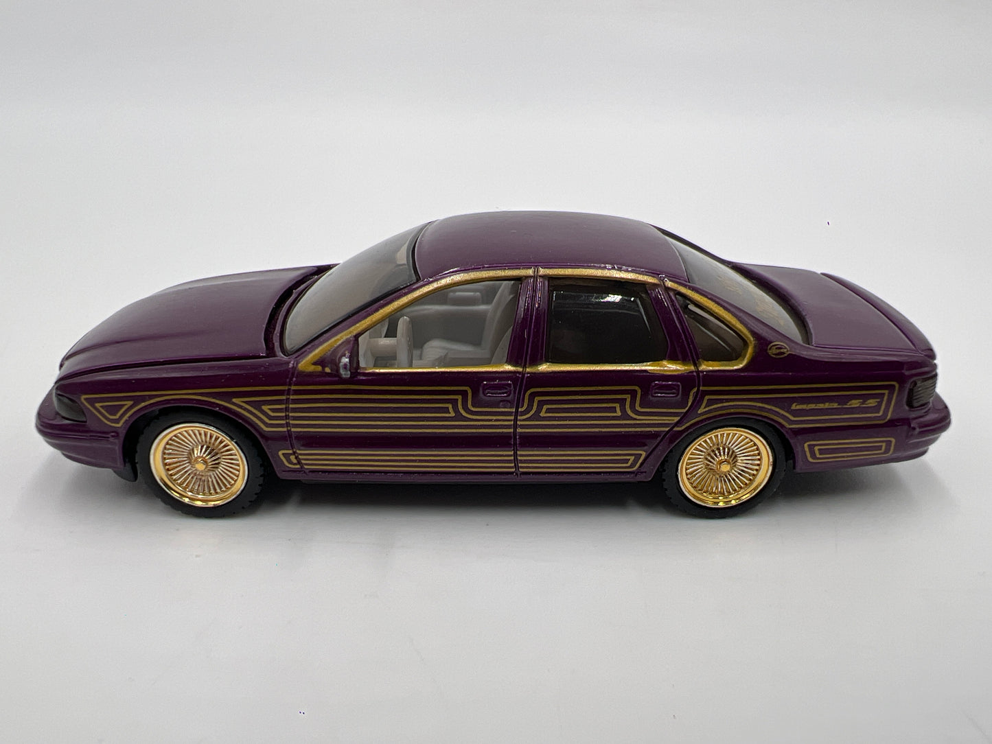 Revell 1/64 Lowrider Magazine #134 96 Chevy Impala SS Purple/Gold Loose