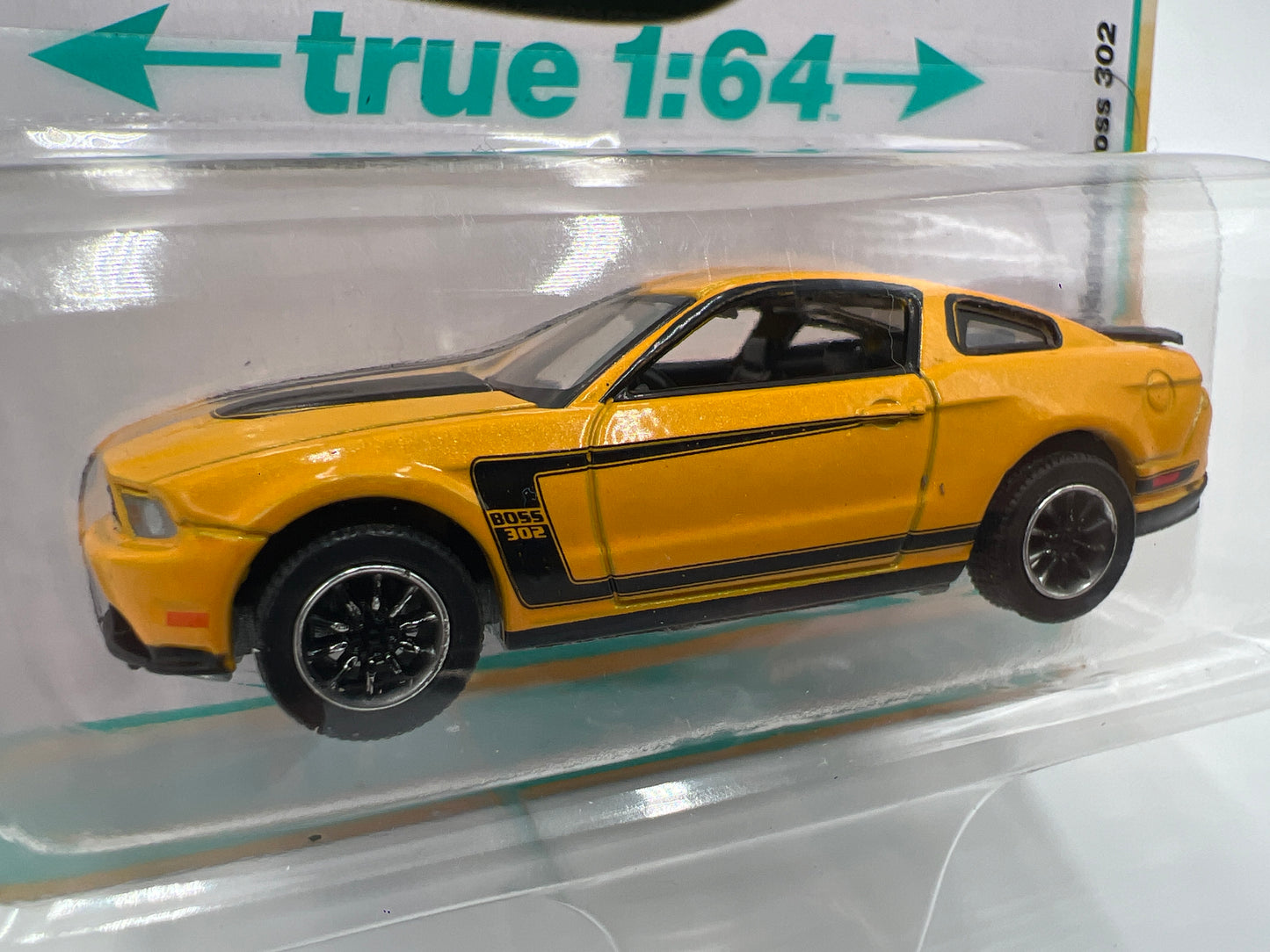 2025 Auto World Modern Muscle Release 1 Version A 2012 Ford Mustang Boss 302 Yellow 184E