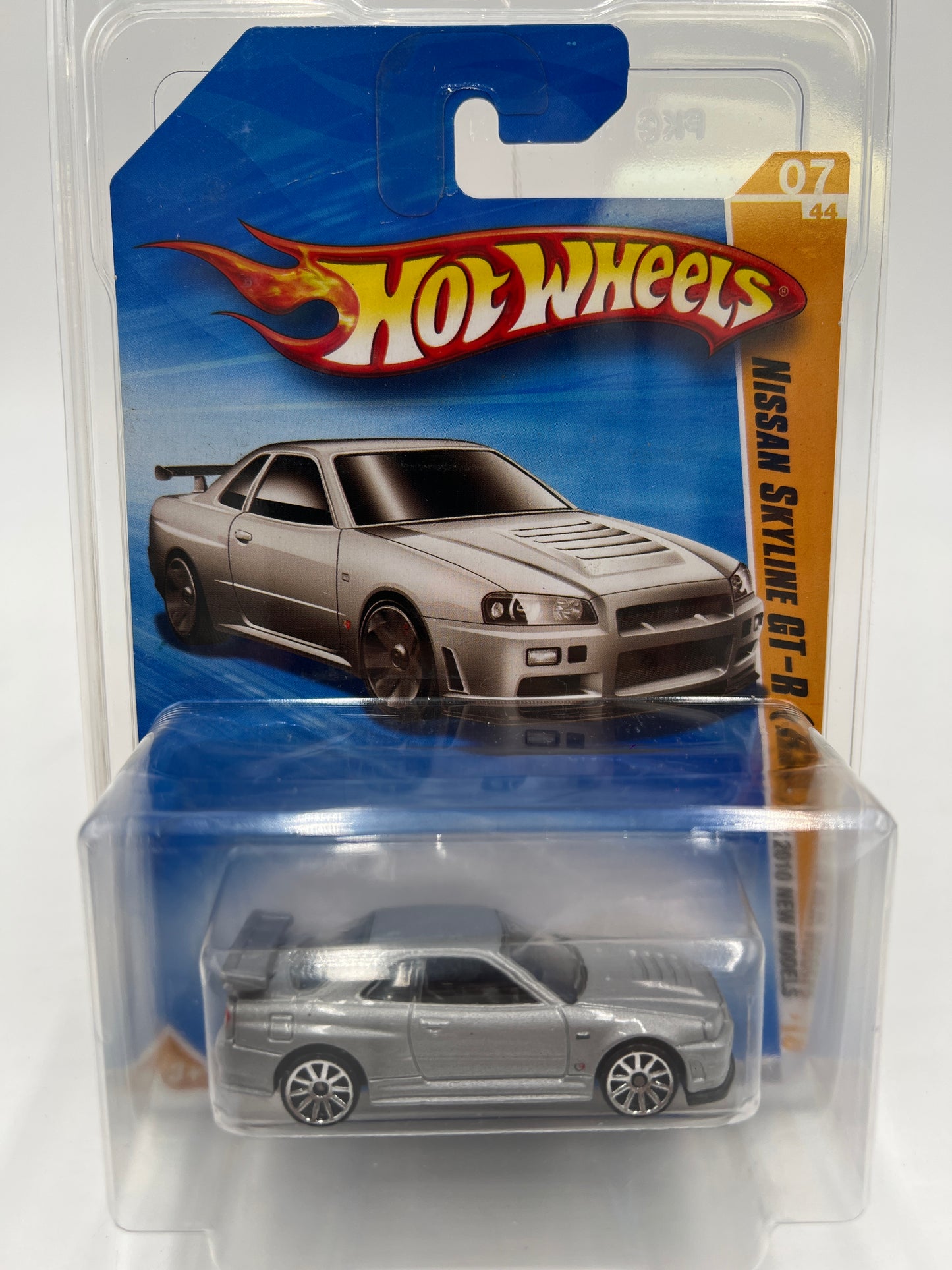 2010 Hot Wheels New Models #007 Nissan Skyline GT-R R34 Silver HTF W/Protector *Bad Card*