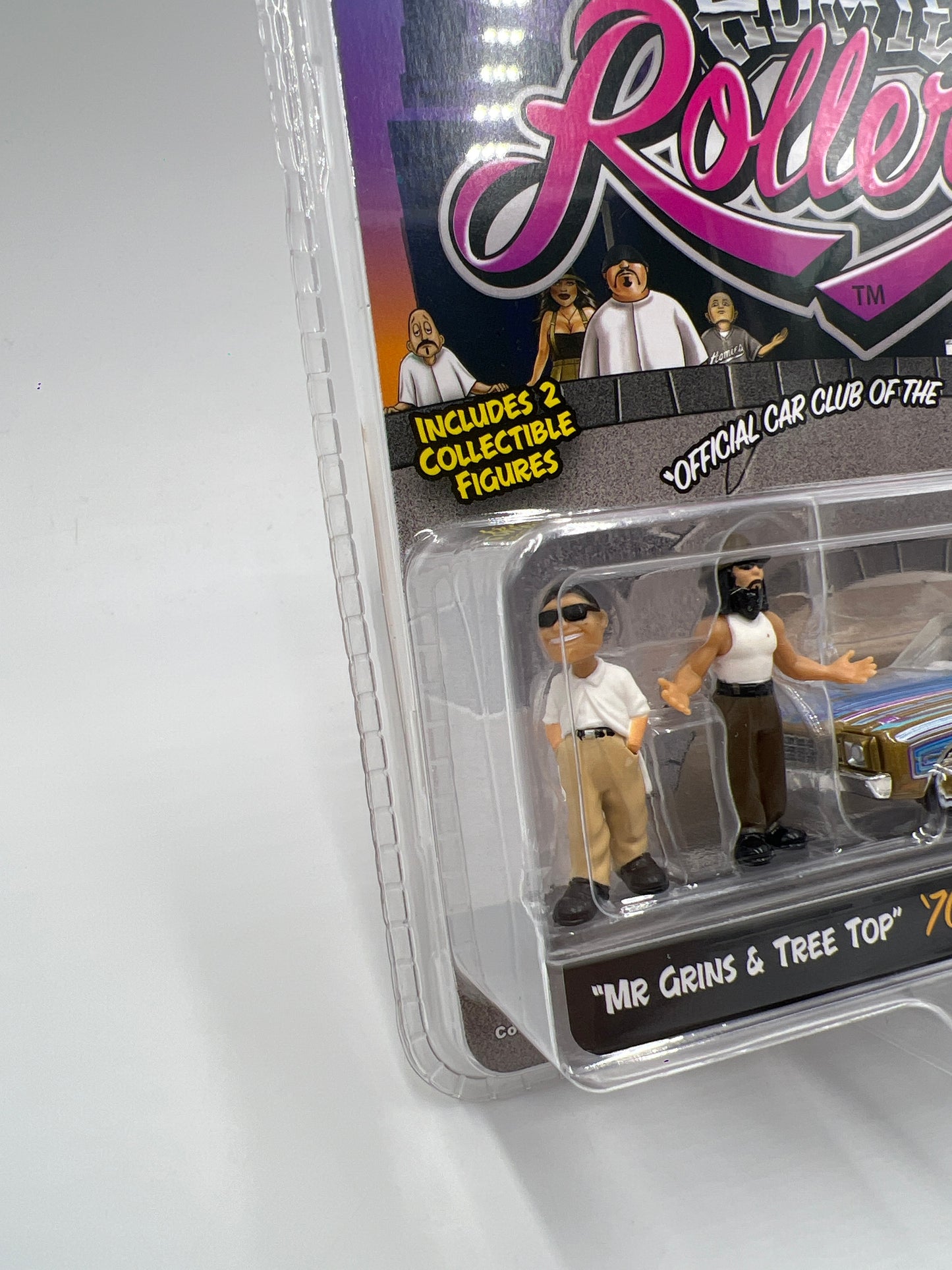 Greenlight x DGA Homie Rollerz CHASE 70 Chevy Monte Carlo Blue/Gold & Mr Grins/Tree Top