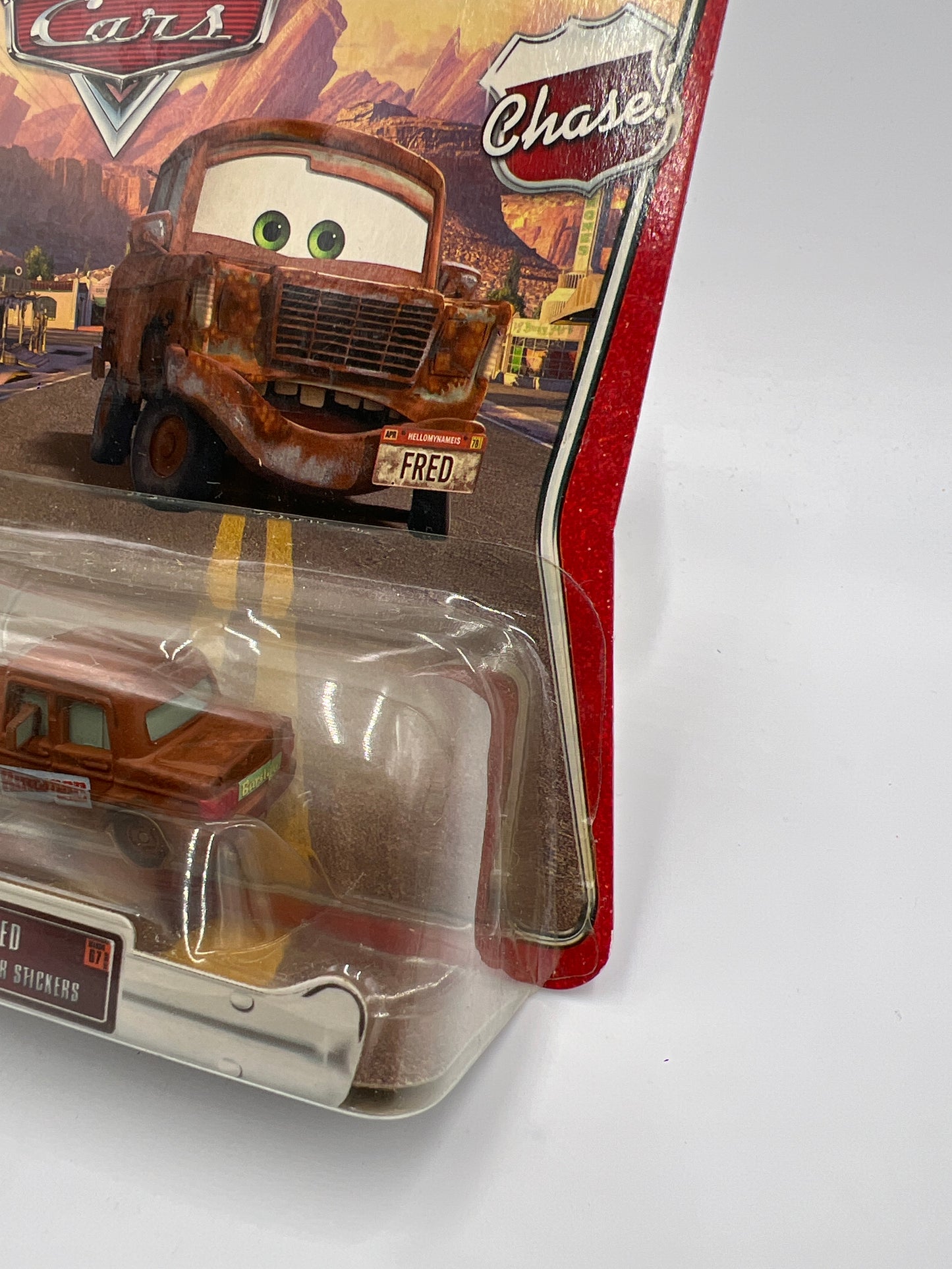 Disney Pixar The World Of Cars #67 CHASE Fred With Bumper Stickers Loose Blister