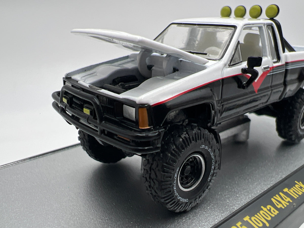 2026 M2 Machines R01 Blind Box 1985 Toyota 4x4 Truck Black/White