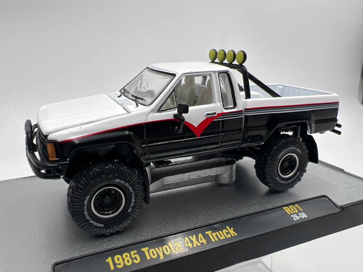 2026 M2 Machines R01 Blind Box 1985 Toyota 4x4 Truck Black/White