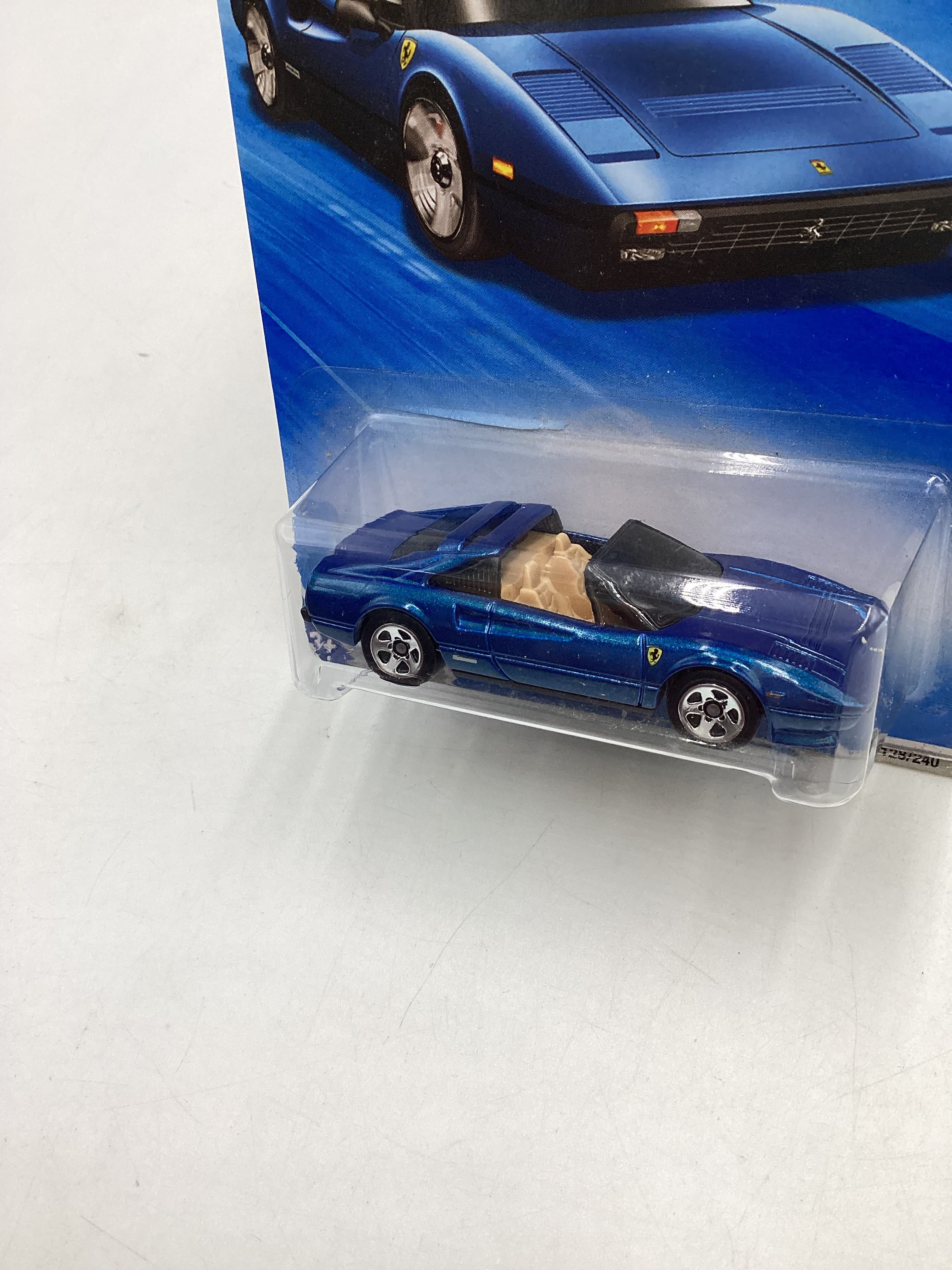 2010 Hot Wheels #128 Blue Ferrari 308 GTS with protector