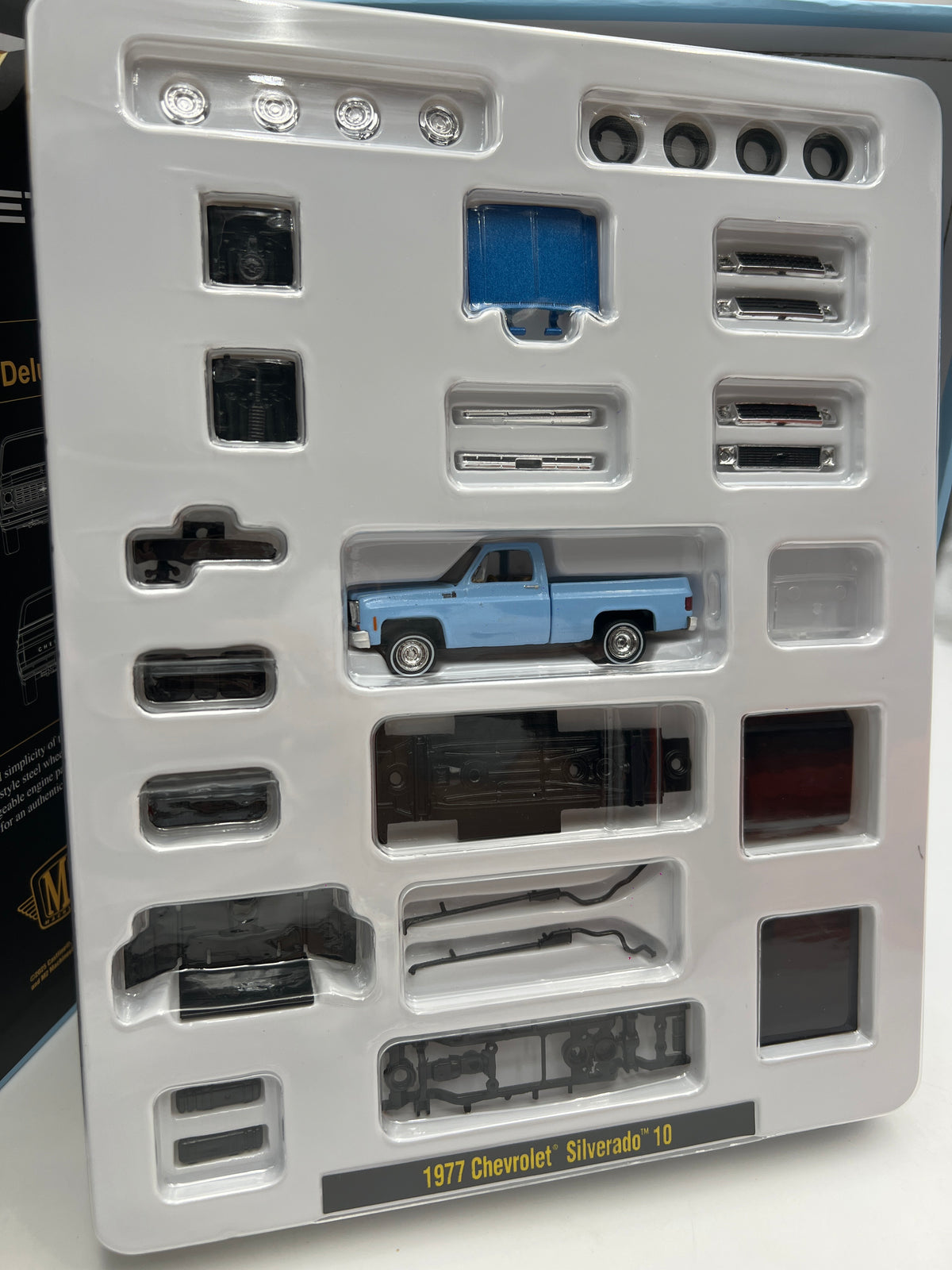 2026 M2 Machines 1/64 Shadow Box 1977 Chevrolet Silverado 10 Light Blue