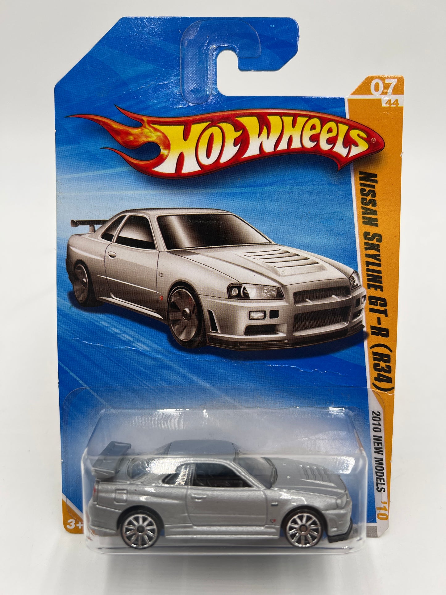 2010 Hot Wheels New Models #007 Nissan Skyline GT-R R34 Silver HTF W/Protector *Bad Card*