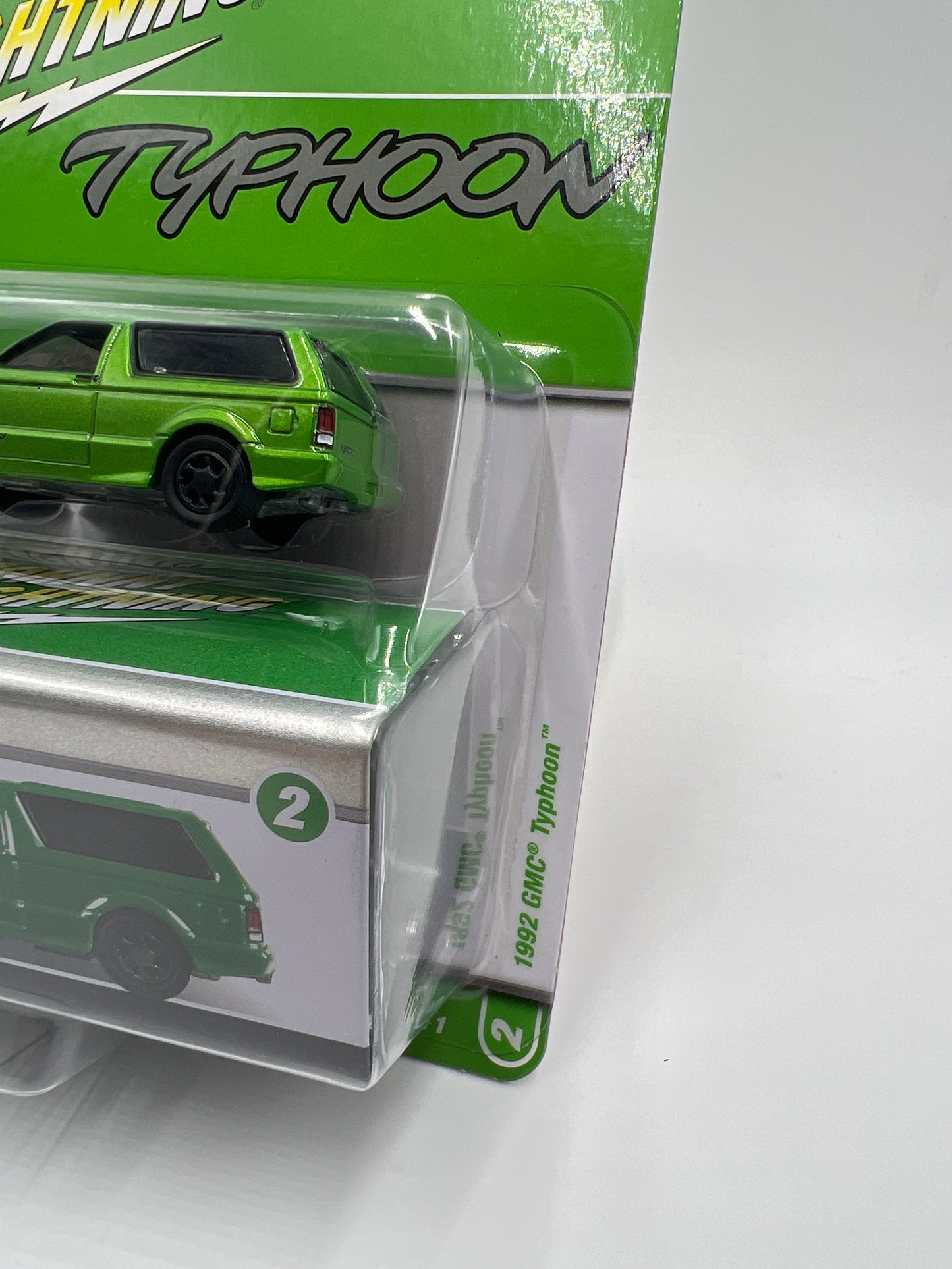 2025 Johnny Lightning Pro Collector Series Release 1 Version B 1992 GMC Typhoon Green W/Storage Tin