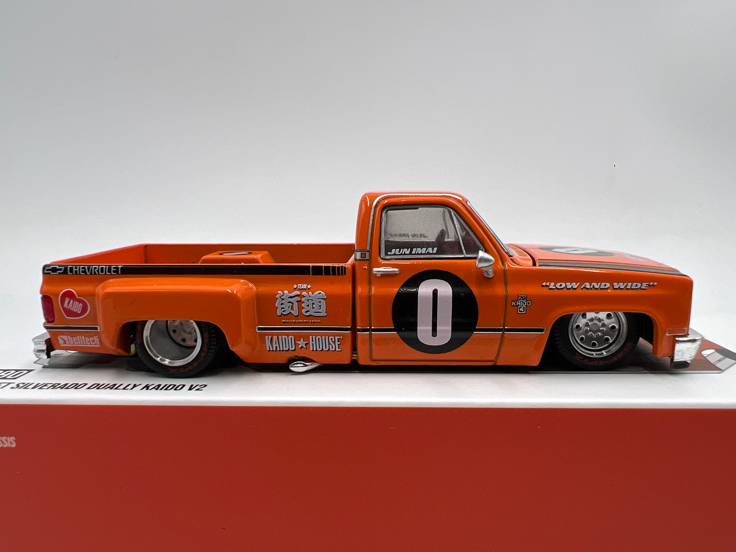 Mini GT x Kaido House #90 Chevrolet Silverado Dually Kaido V2 Orange