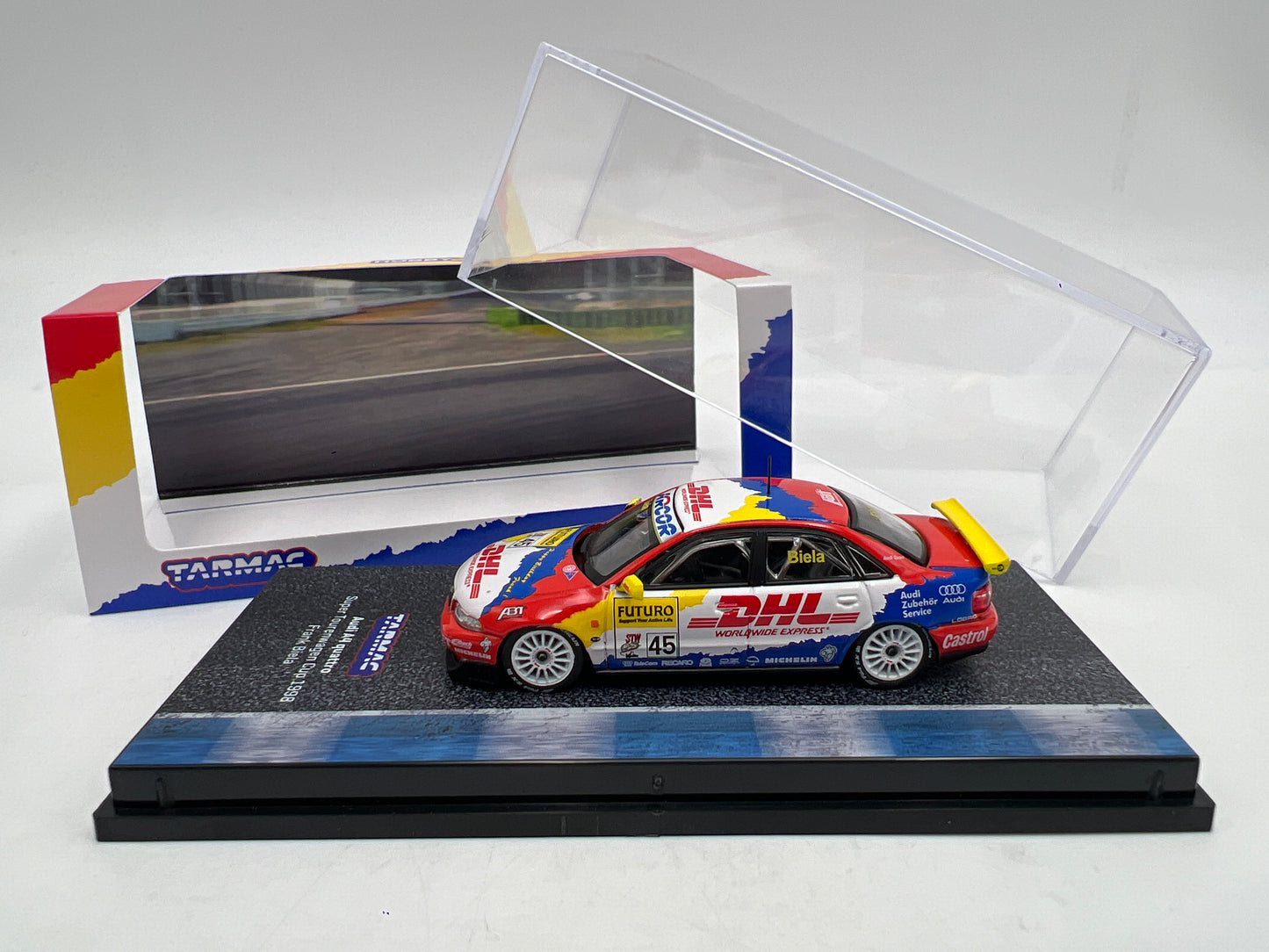Tarmac Works x Hobby64 Audi A4 Quattro DHL Super Tourenwagen Cup 1998