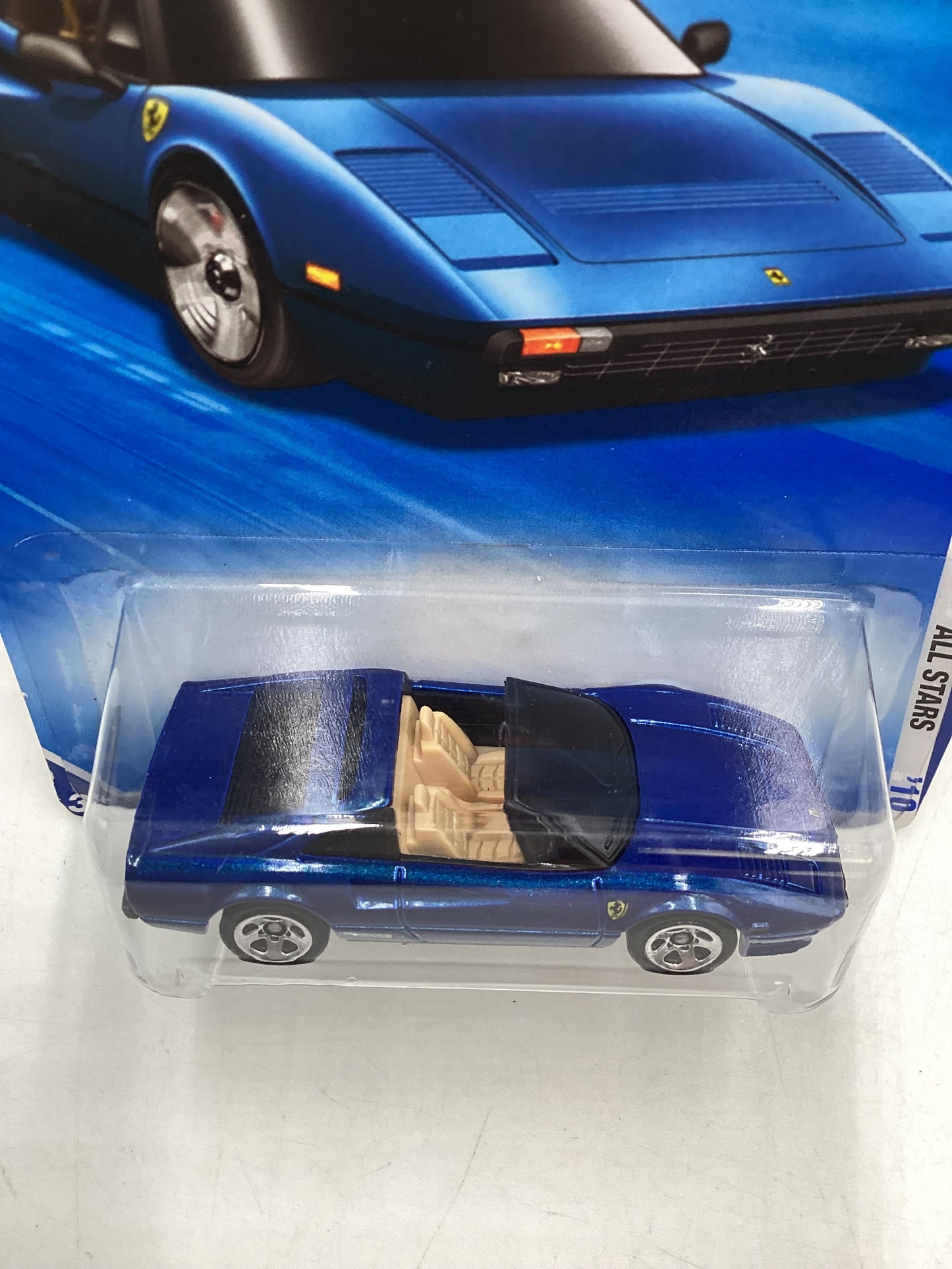 2010 Hot Wheels #128 Blue Ferrari 308 GTS with protector