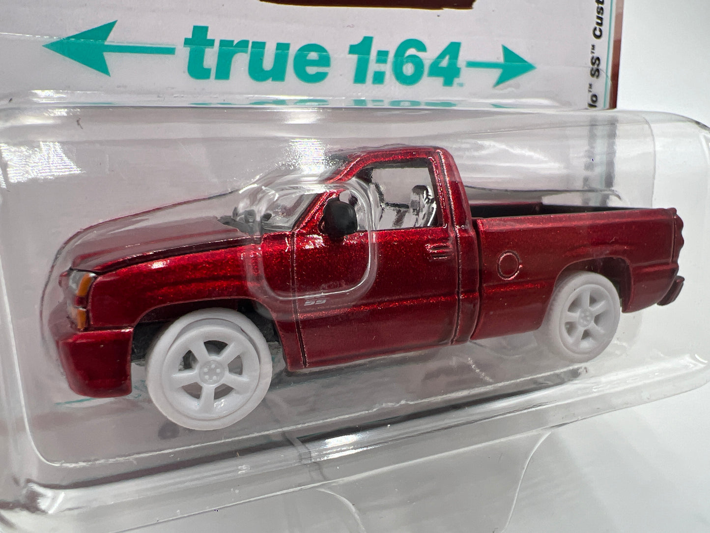 2025 Auto World Muscle Trucks CHASE Release 1 Version B 2005 Chevy Silverado SS Custom Ultra Red Cateye